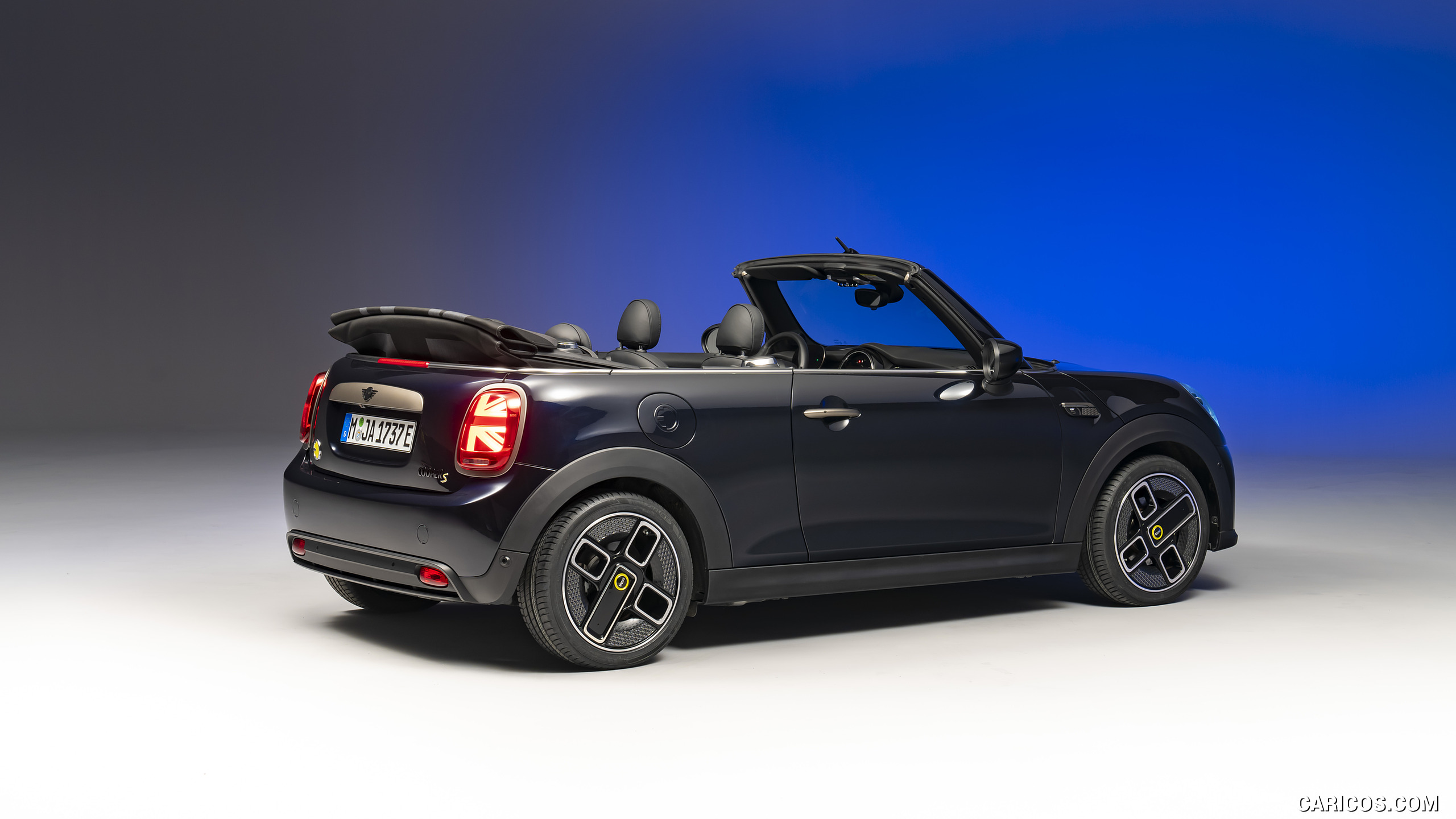 2023 MINI Cooper SE Convertible (Color: Enigmatic Black) - Rear Three-Quarter, #204 of 225