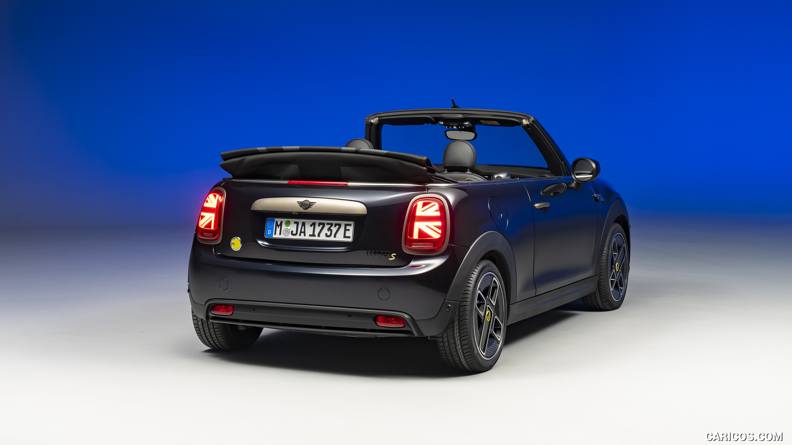 2023 MINI Cooper SE Convertible (Color: Enigmatic Black) - Rear Three-Quarter, #205 of 225