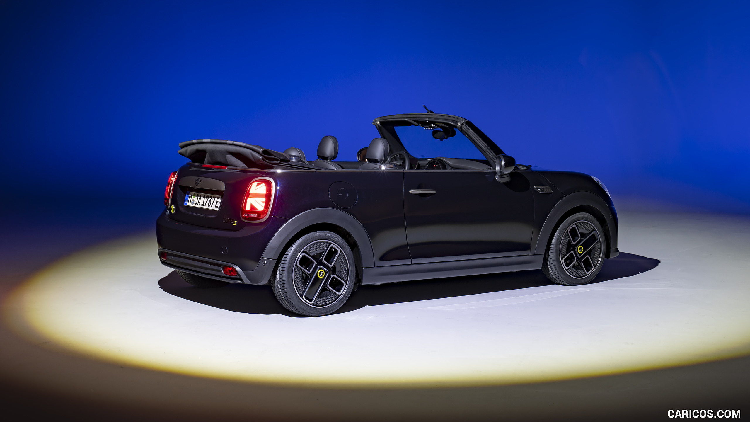 2023 MINI Cooper SE Convertible (Color: Enigmatic Black) - Rear Three-Quarter, #211 of 225