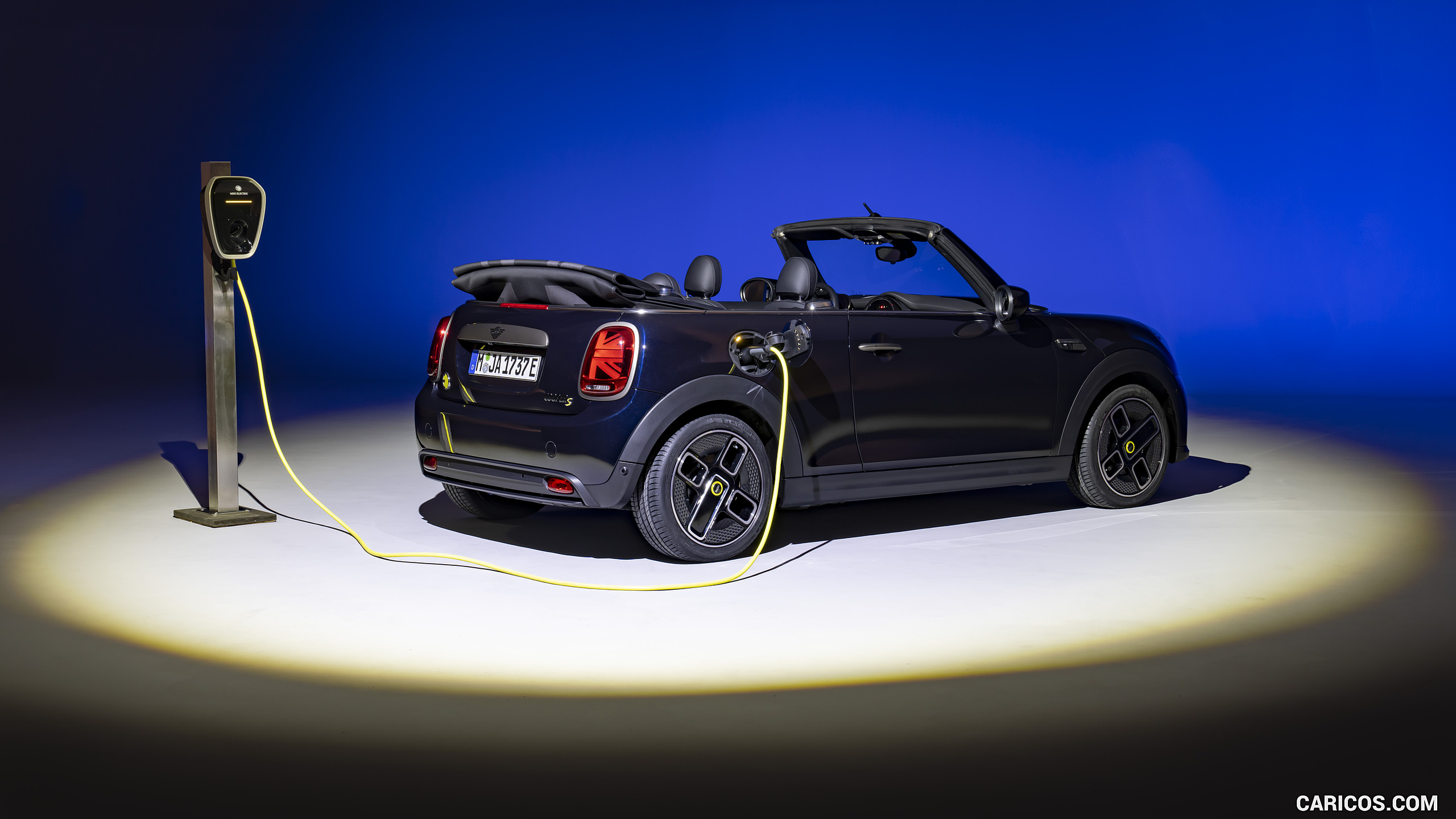 2023 MINI Cooper SE Convertible (Color: Enigmatic Black) - Rear Three-Quarter, #214 of 225