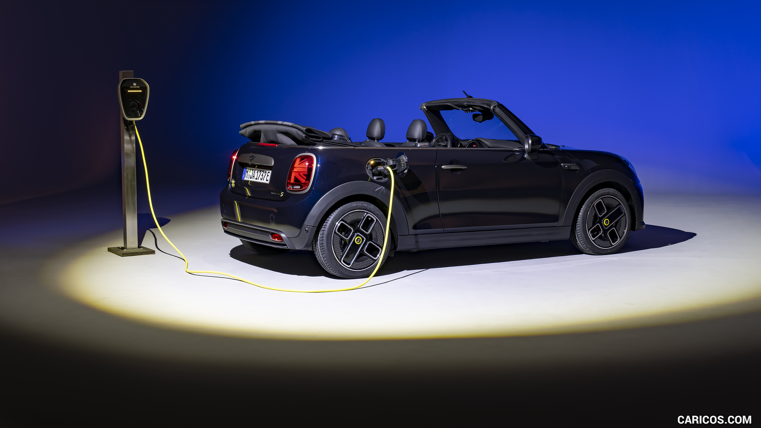 2023 MINI Cooper SE Convertible (Color: Enigmatic Black) - Rear Three-Quarter, #215 of 225