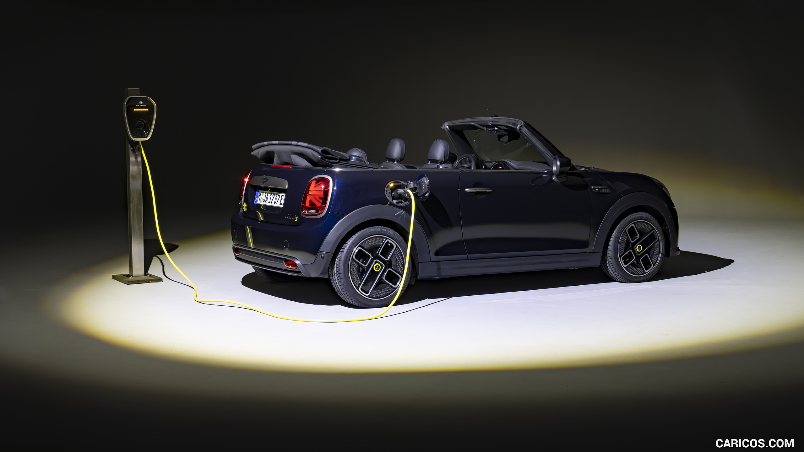 2023 MINI Cooper SE Convertible (Color: Enigmatic Black) - Rear Three-Quarter, #216 of 225