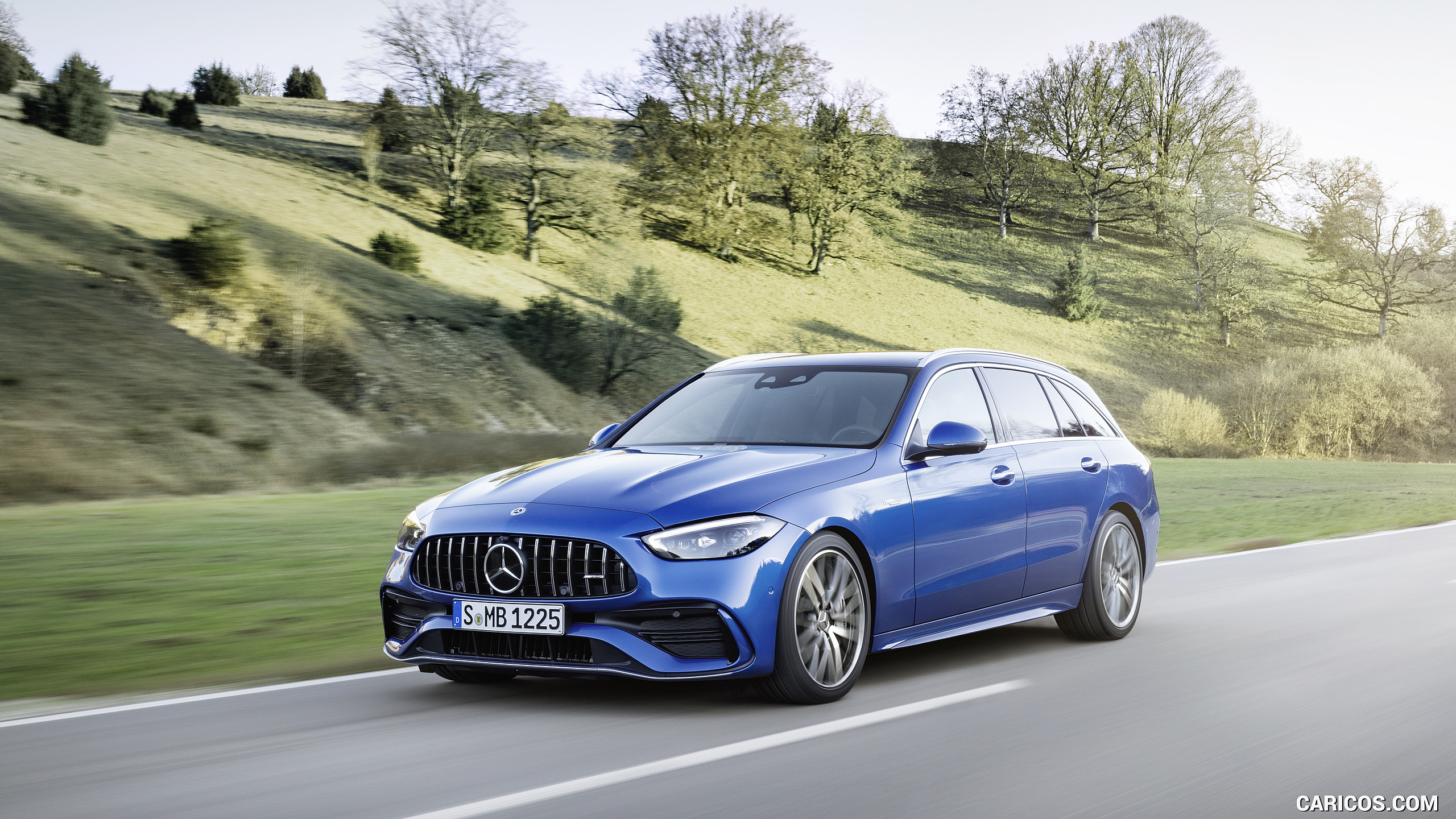 2023 Mercedes-AMG C 43 Estate 4MATIC T-Modell (Color: Spectral Blue) - Front Three-Quarter, #1 of 29