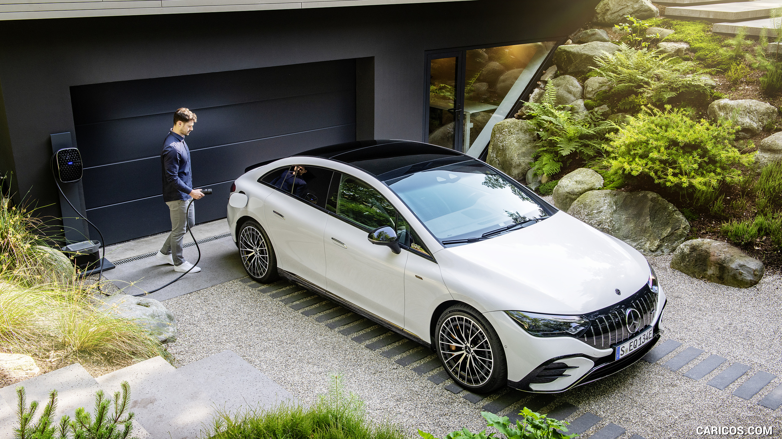 2023 Mercedes-AMG EQE 53 4MATIC+ (Color: Opalite White Bright) - Front Three-Quarter, #17 of 239