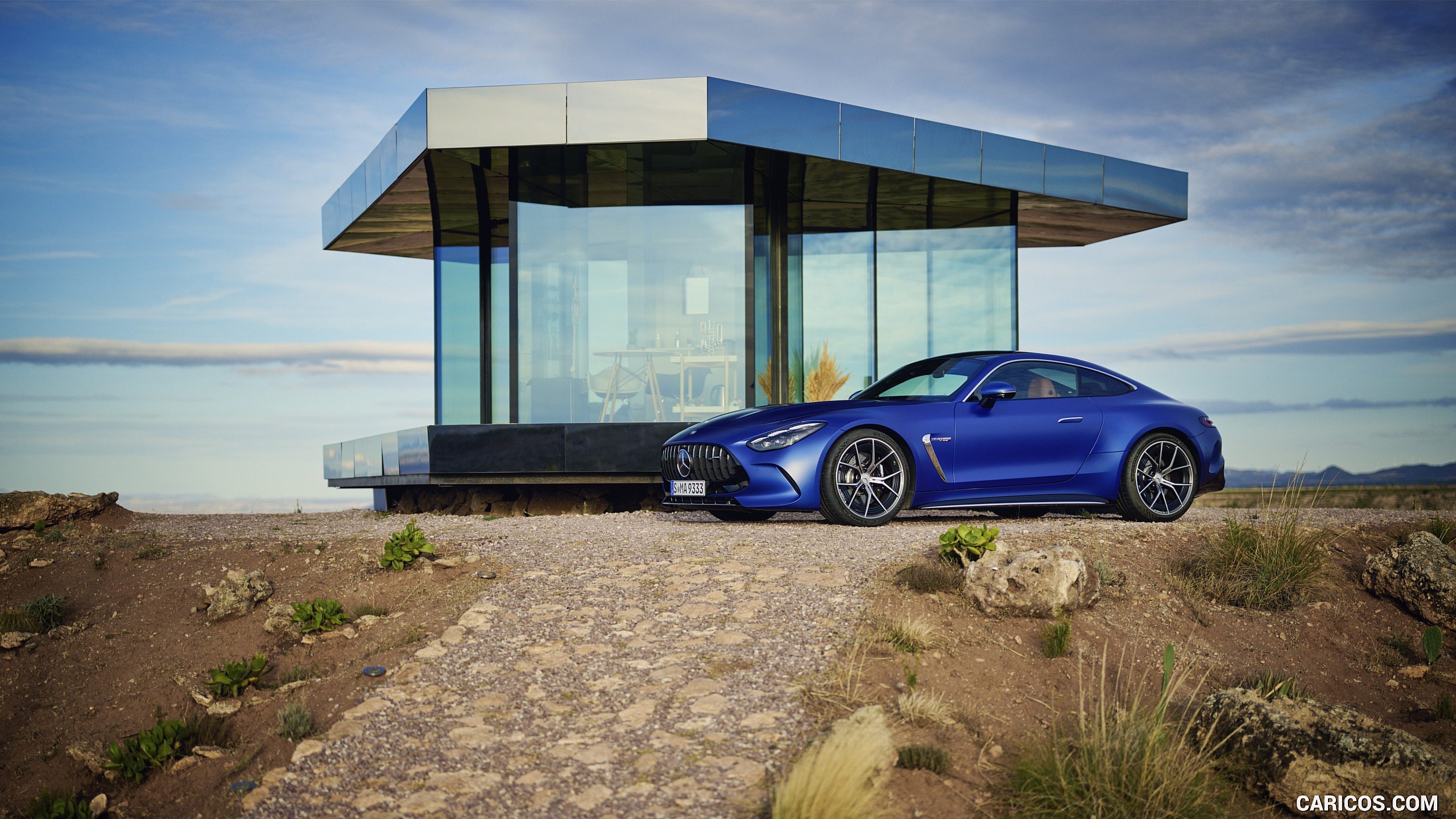 2024 Mercedes-AMG GT 63 4MATIC+ Coupé (Color: MANUFAKTUR Spectral Blue magno) - Front Three-Quarter, #87 of 241