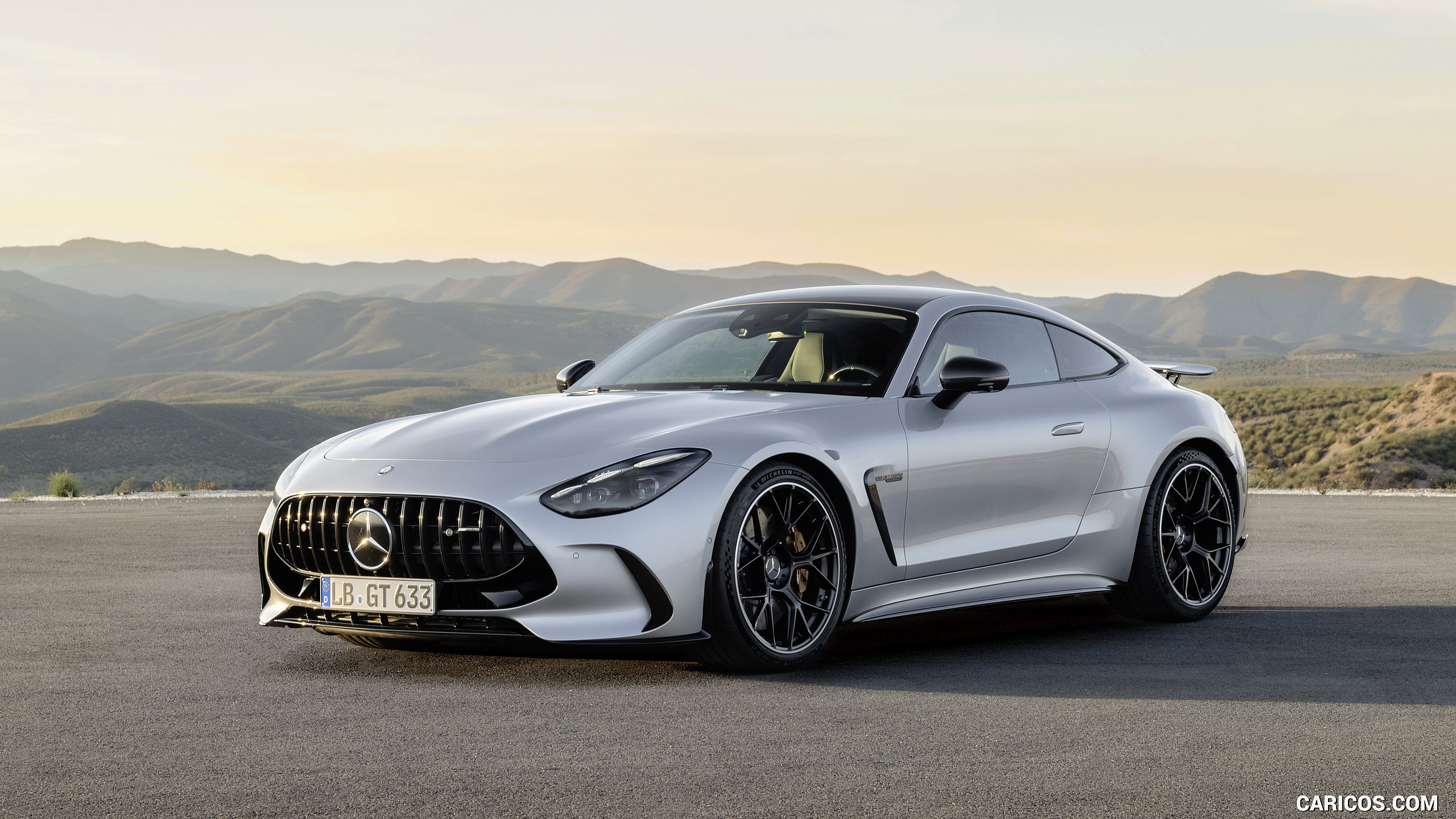 2024 Mercedes-AMG GT 63 Coupé 4MATIC+ with AMG Aerodynamic package (Color: High-Tech Silver Metallic) - Front Three-Quarter, #28 of 62