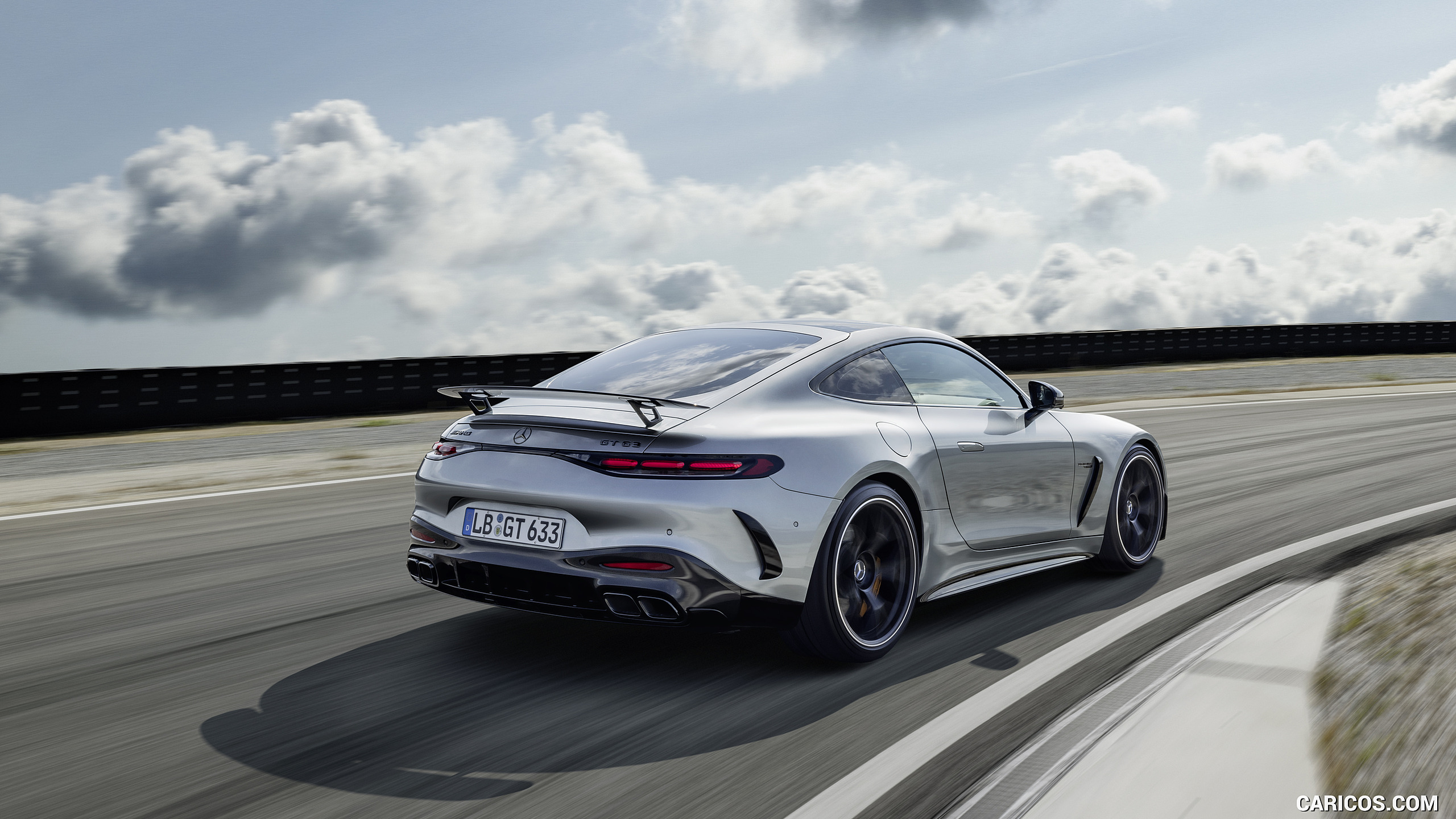 2024 Mercedes-AMG GT 63 Coupé 4MATIC+ with AMG Aerodynamic package (Color: High-Tech Silver Metallic) - Rear Three-Quarter, #11 of 241