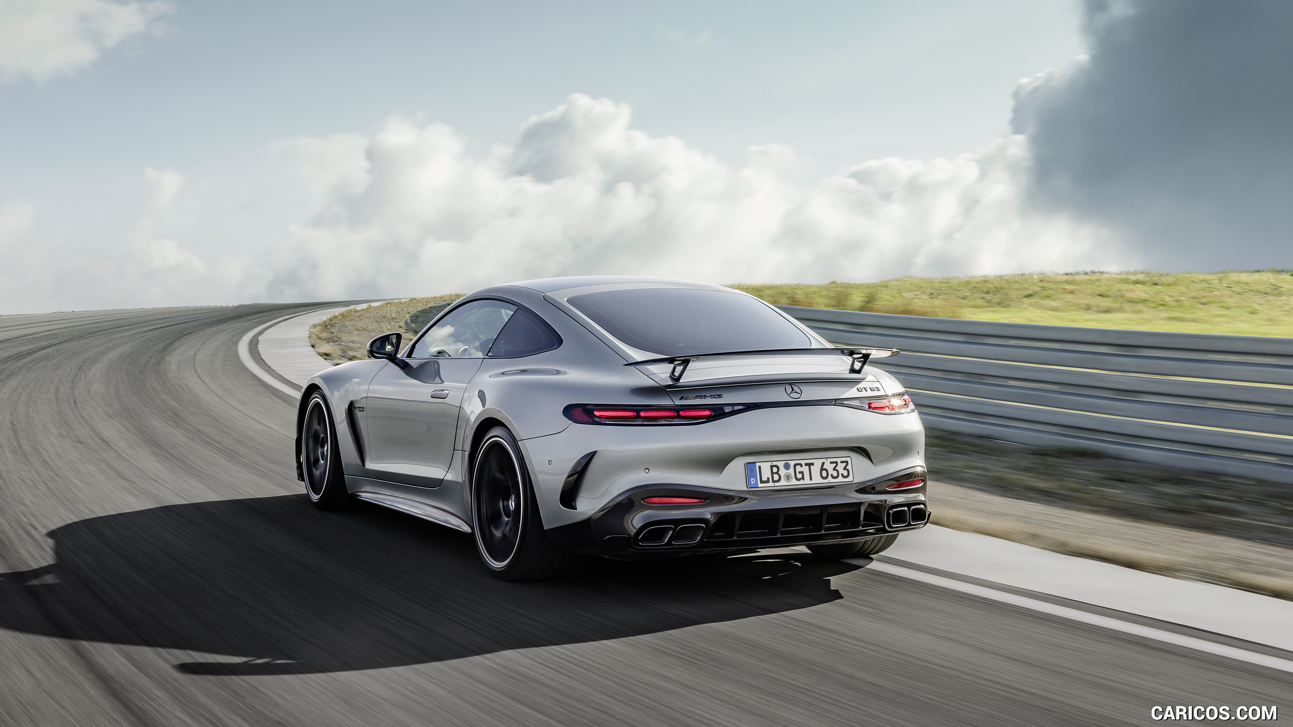 2024 Mercedes-AMG GT 63 Coupé 4MATIC+ with AMG Aerodynamic package (Color: High-Tech Silver Metallic) - Rear Three-Quarter, #15 of 62