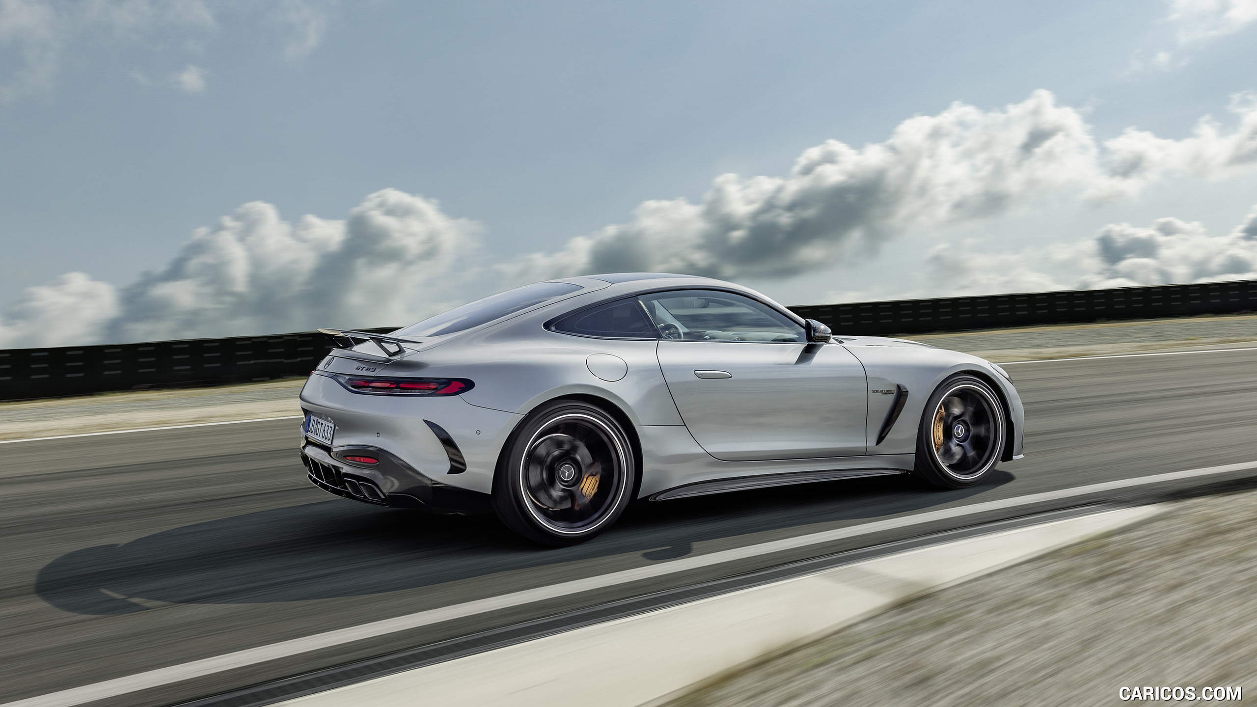 2024 Mercedes-AMG GT 63 Coupé 4MATIC+ with AMG Aerodynamic package (Color: High-Tech Silver Metallic) - Rear Three-Quarter, #18 of 62