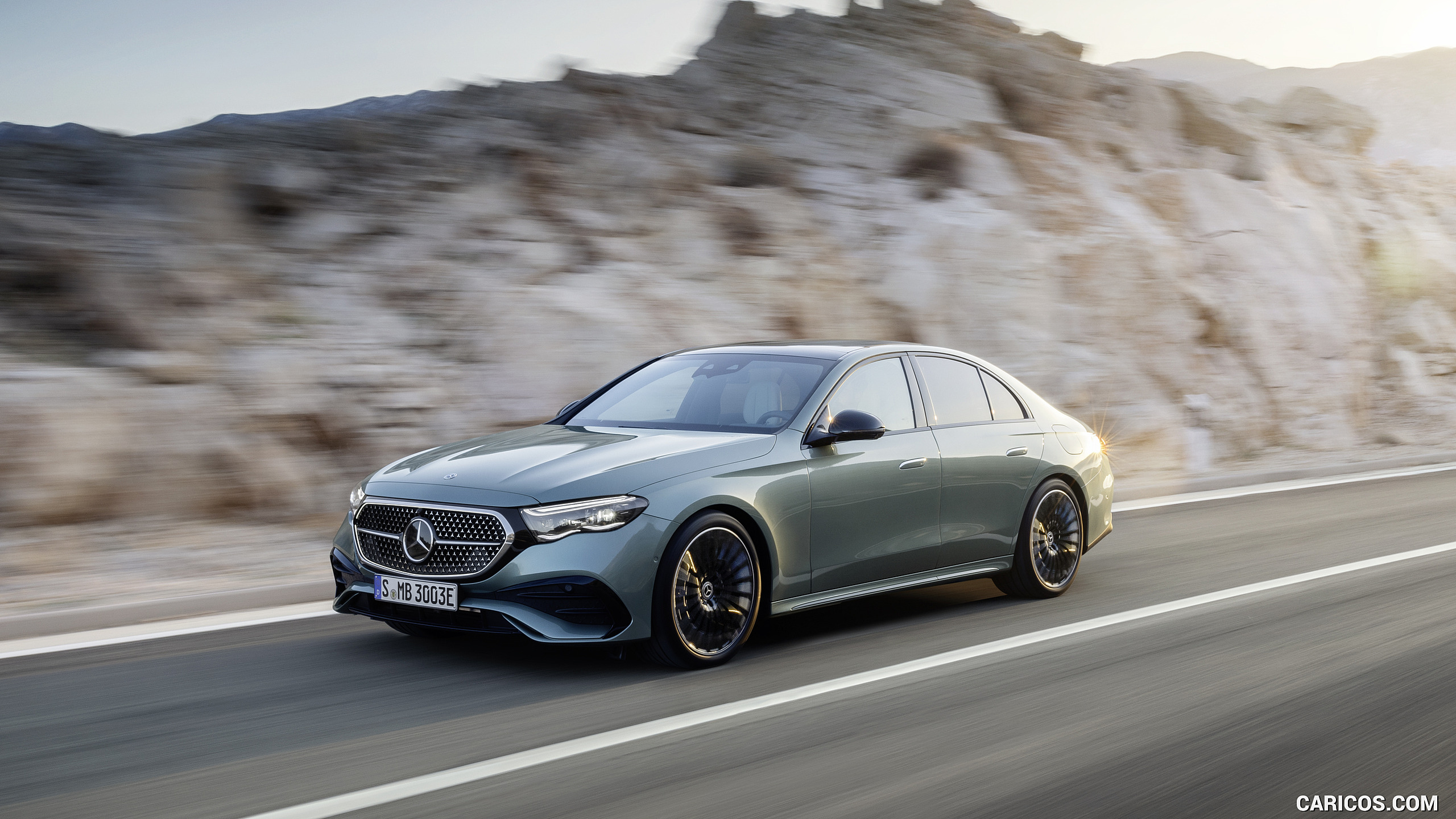 2024 Mercedes-Benz E-Class Plug-In Hybrid AMG Line Color: (Verde Silver) - Front Three-Quarter, #7 of 158