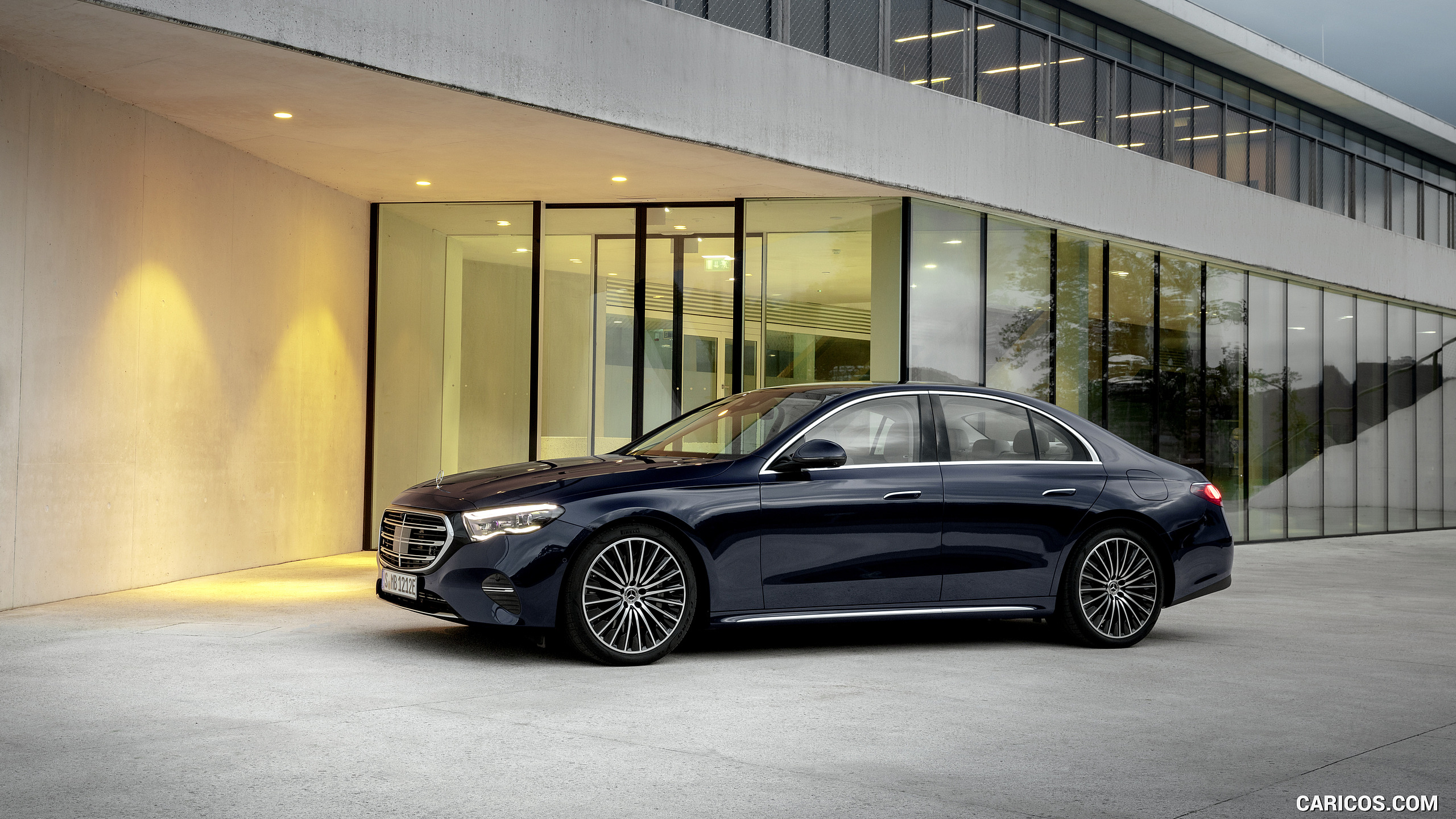 2024 Mercedes-Benz E-Class Plug-In Hybrid Exclusive Line (Color: Nautic Blue) - Front Three-Quarter, #92 of 158