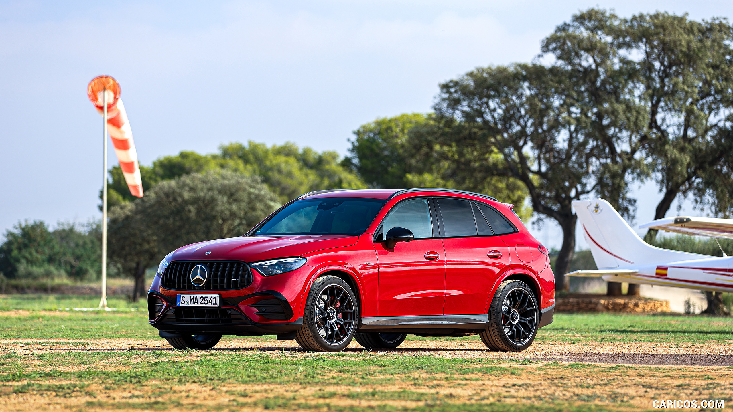 2025 Mercedes-AMG GLC 63 S E PERFORMANCE (Color: Patagonia Red Metallic) - Front Three-Quarter, #111 of 210