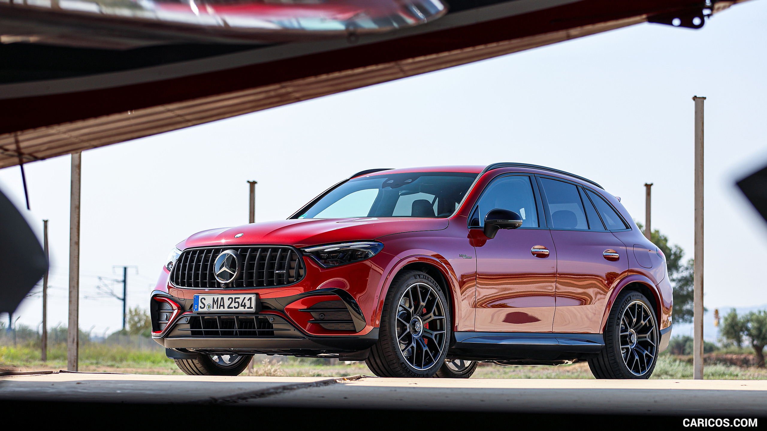 2025 Mercedes-AMG GLC 63 S E PERFORMANCE (Color: Patagonia Red Metallic) - Front Three-Quarter, #117 of 210