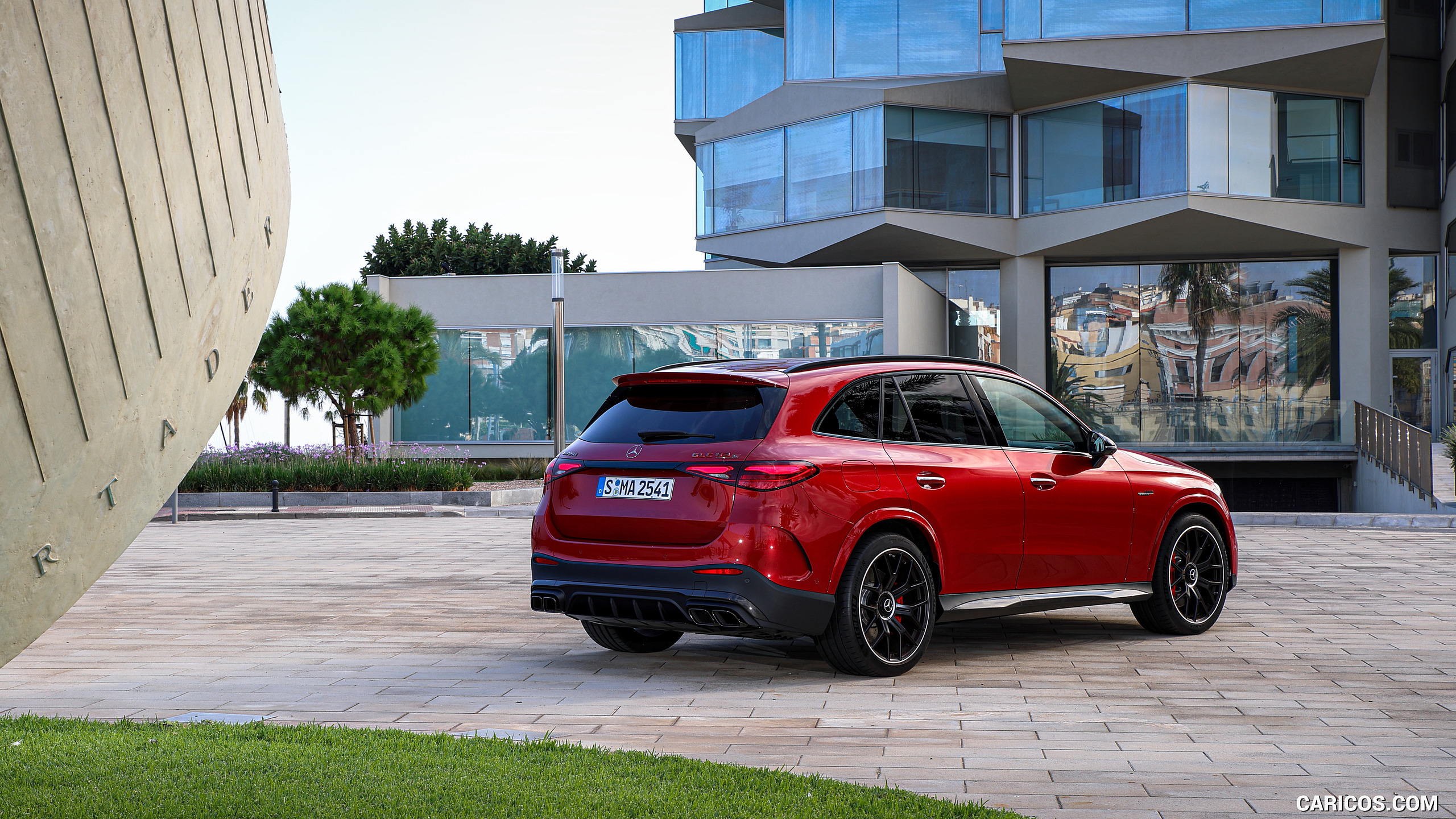 2025 Mercedes-AMG GLC 63 S E PERFORMANCE (Color: Patagonia Red Metallic) - Rear Three-Quarter, #106 of 210