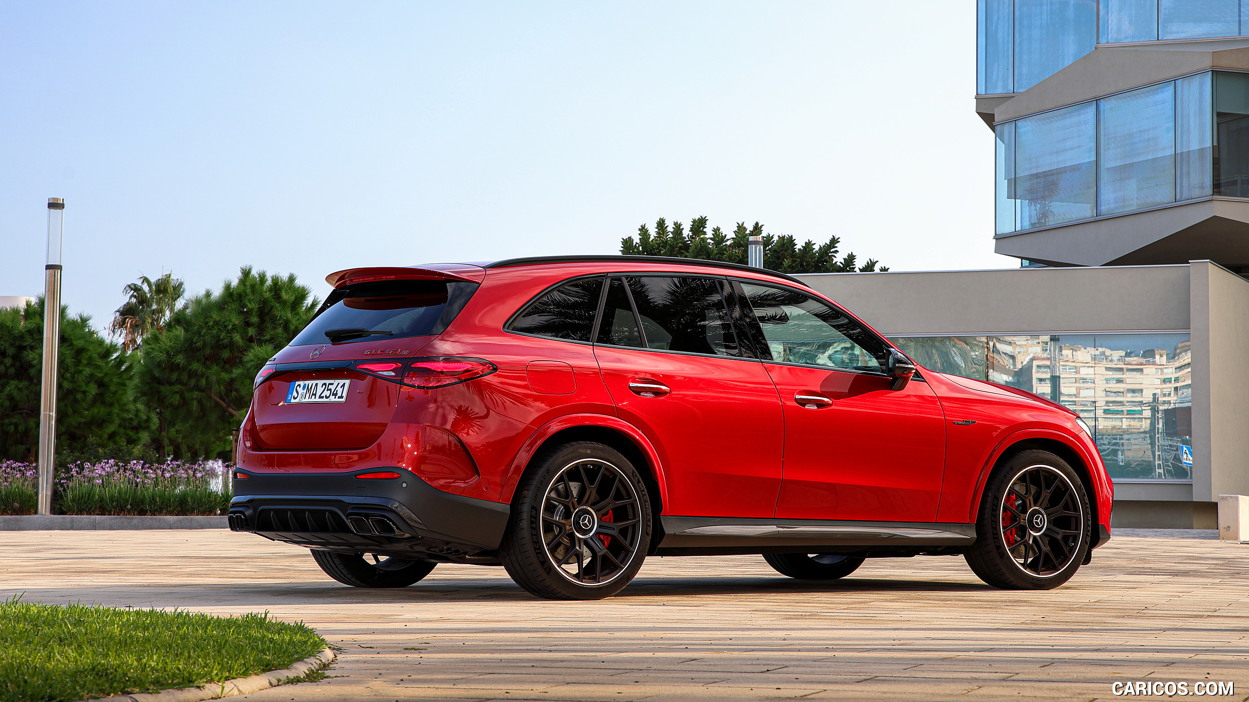 2025 Mercedes-AMG GLC 63 S E PERFORMANCE (Color: Patagonia Red Metallic) - Rear Three-Quarter, #109 of 210