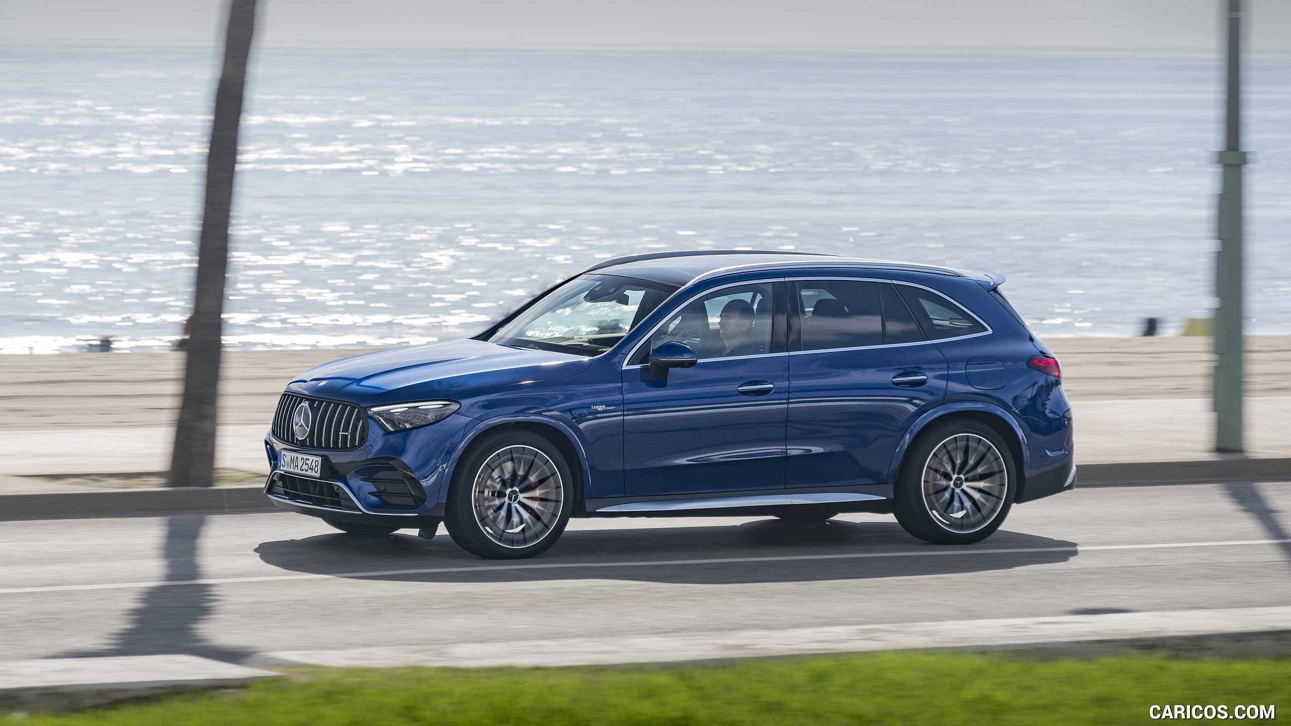 2025 Mercedes-AMG GLC 63 S E PERFORMANCE (Color: Spectral Blue Metallic) - Front Three-Quarter, #19 of 210