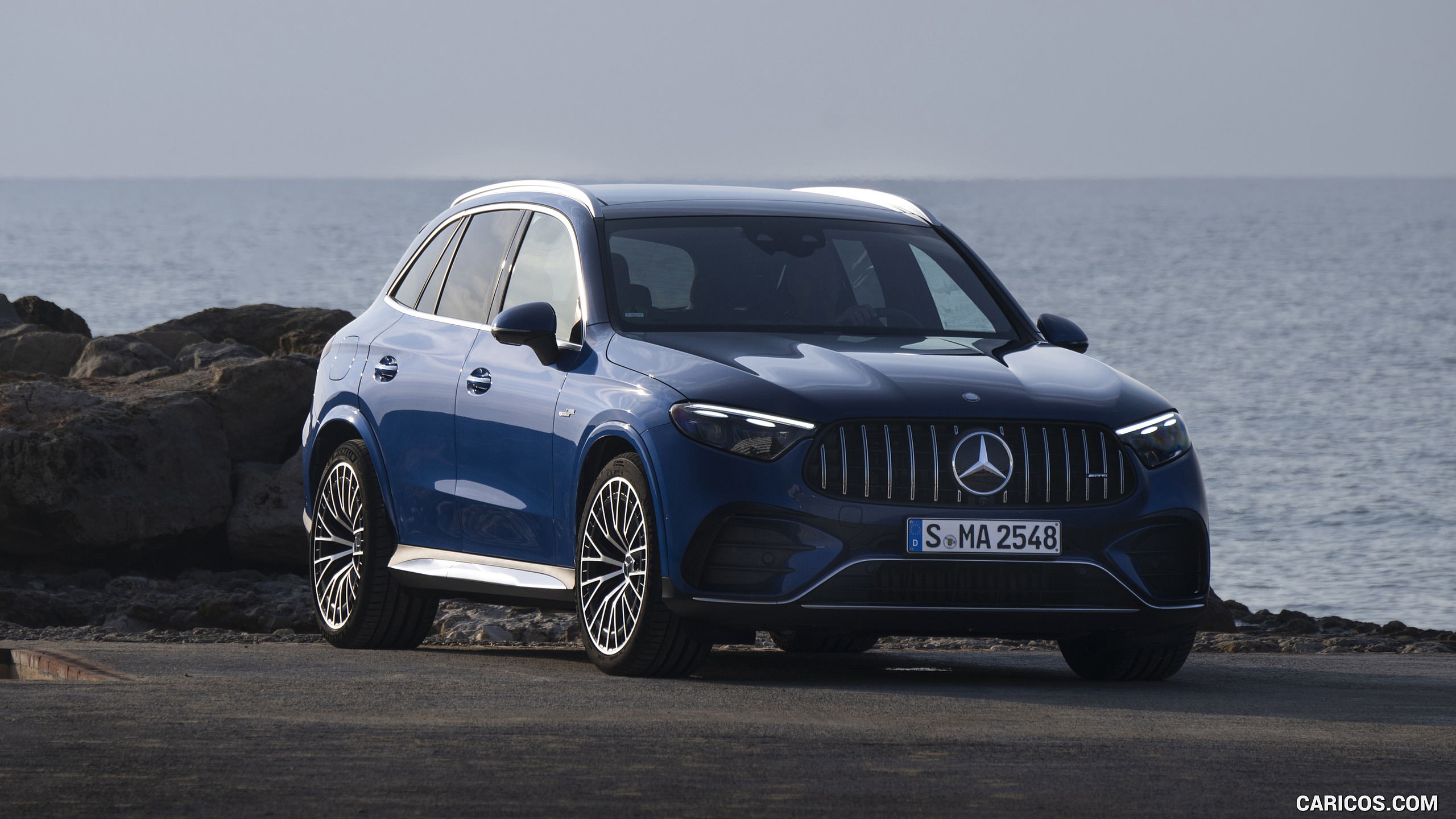 2025 Mercedes-AMG GLC 63 S E PERFORMANCE (Color: Spectral Blue Metallic) - Front Three-Quarter, #24 of 210