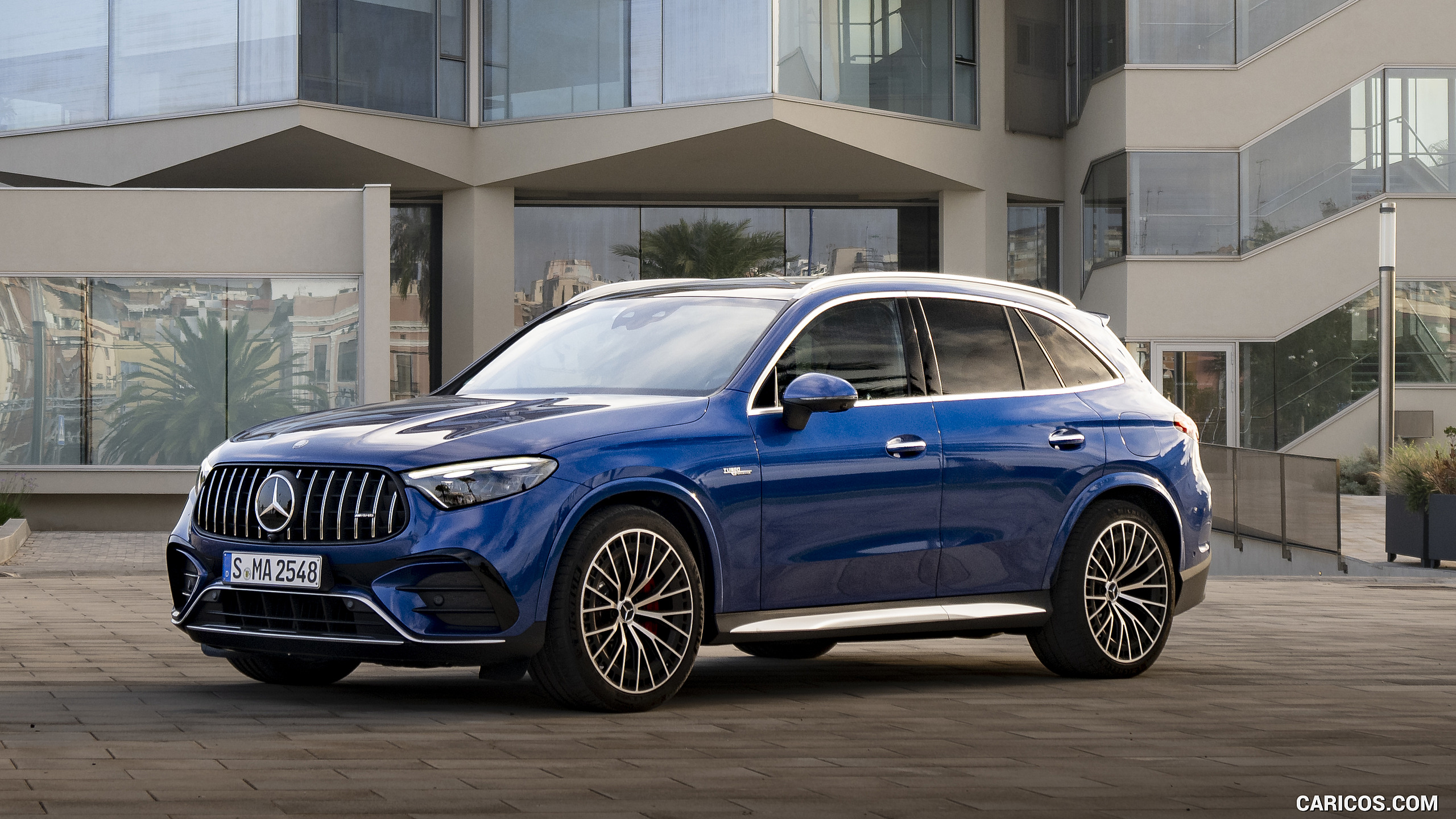 2025 Mercedes-AMG GLC 63 S E PERFORMANCE (Color: Spectral Blue Metallic) - Front Three-Quarter, #32 of 210