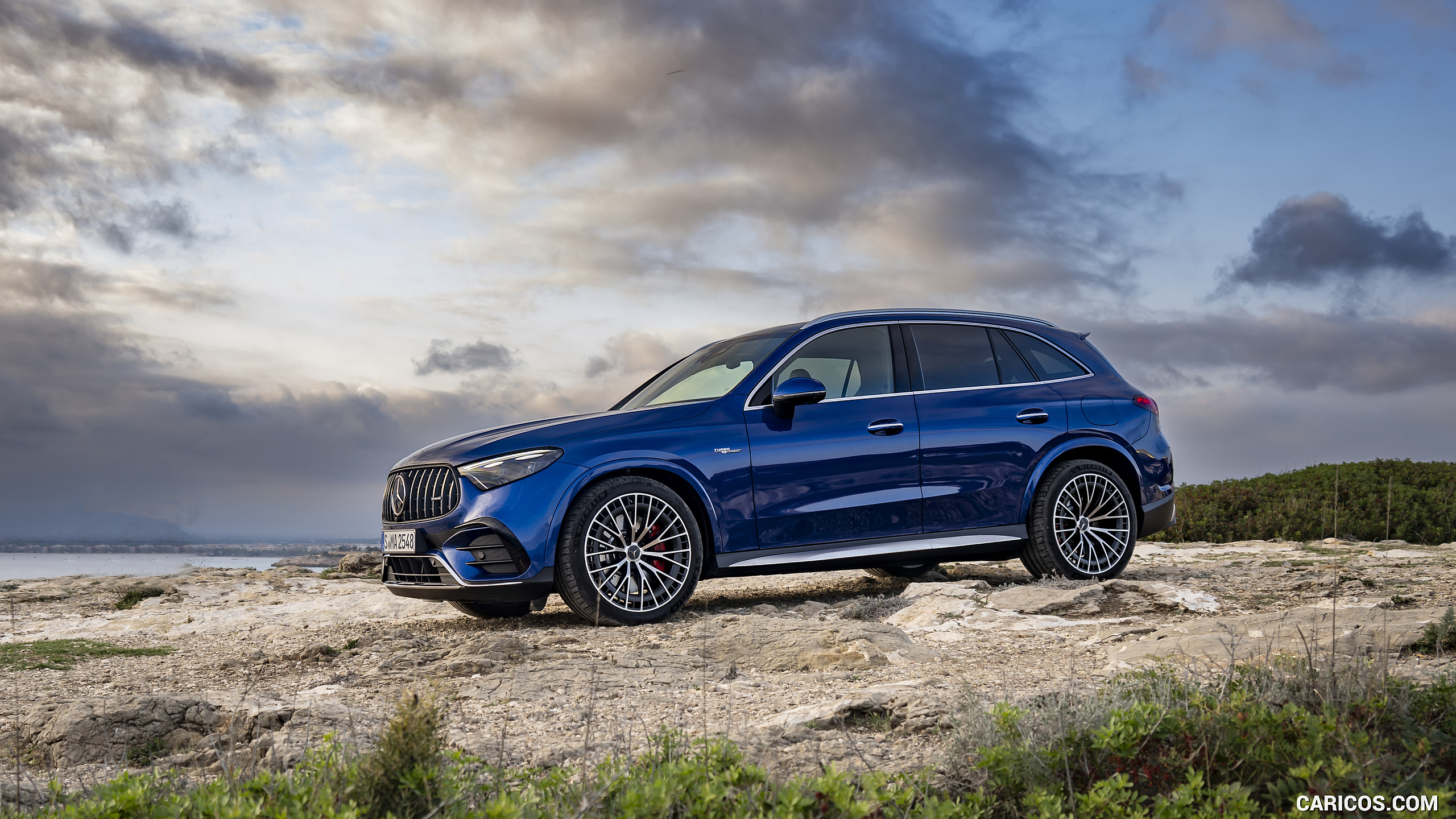 2025 Mercedes-AMG GLC 63 S E PERFORMANCE (Color: Spectral Blue Metallic) - Front Three-Quarter, #54 of 210