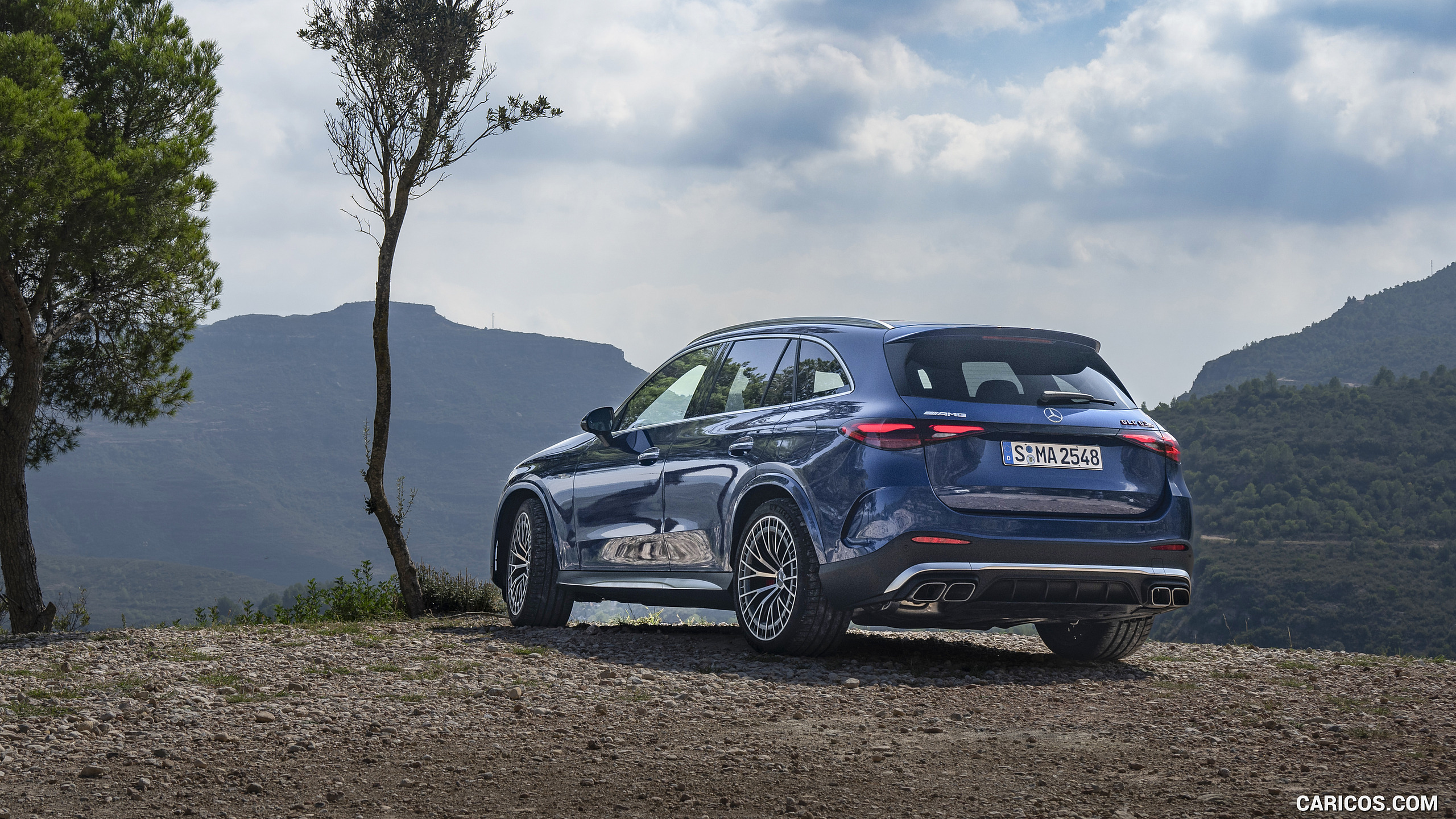 2025 Mercedes-AMG GLC 63 S E PERFORMANCE (Color: Spectral Blue Metallic) - Rear Three-Quarter, #26 of 210