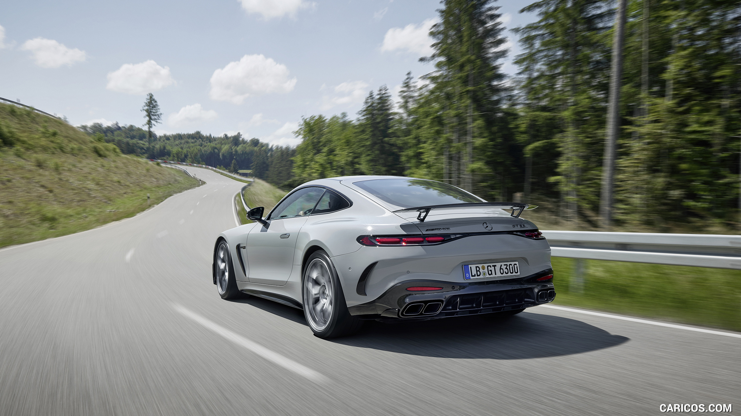 2025 Mercedes-AMG GT 63 PRO 4MATIC+ (Color: MANUFAKTUR Alpine Gray Solid) - Rear Three-Quarter, #2 of 44