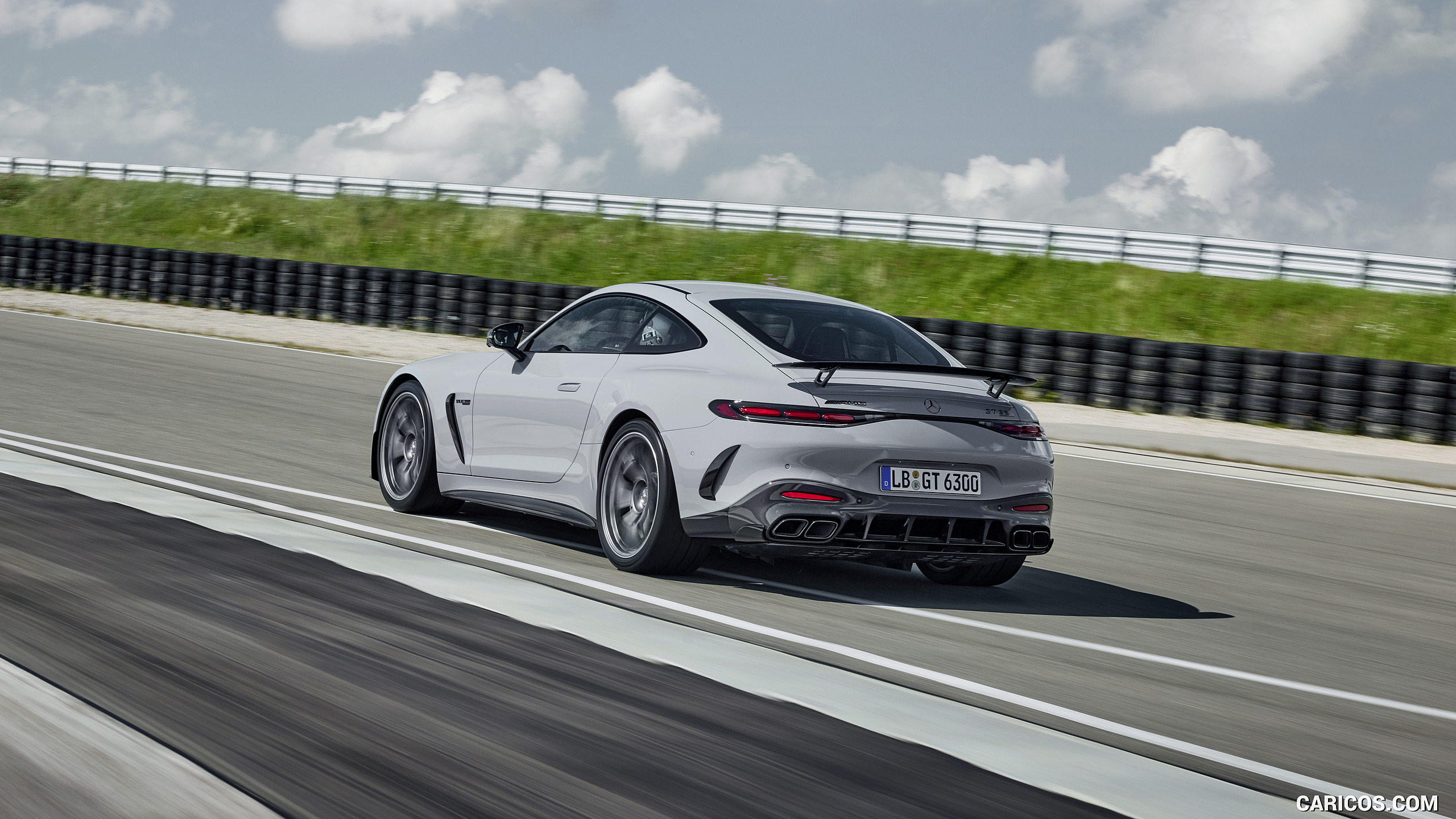 2025 Mercedes-AMG GT 63 PRO 4MATIC+ (Color: MANUFAKTUR Alpine Gray Solid) - Rear Three-Quarter, #14 of 44