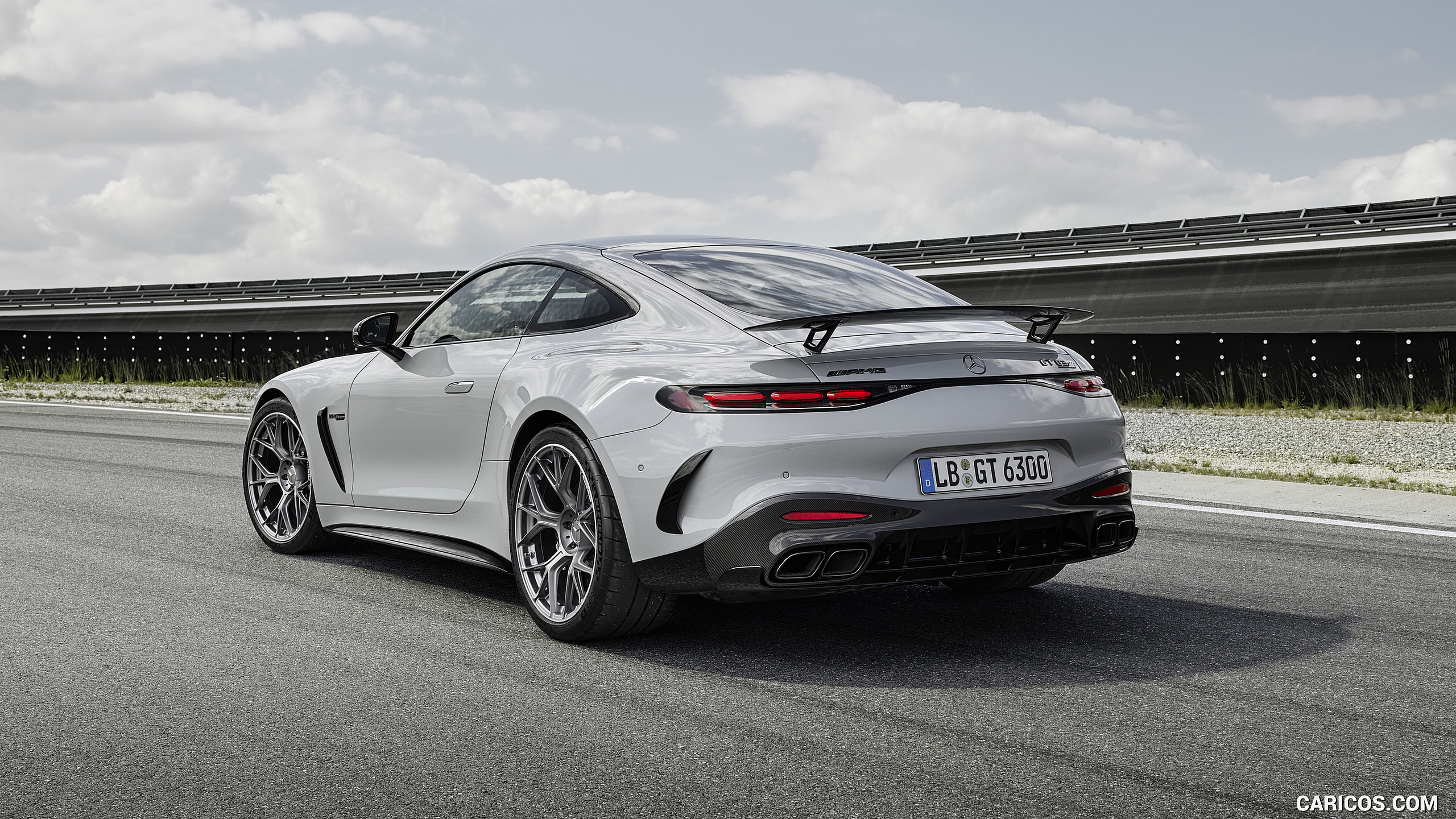 2025 Mercedes-AMG GT 63 PRO 4MATIC+ (Color: MANUFAKTUR Alpine Gray Solid) - Rear Three-Quarter, #23 of 44