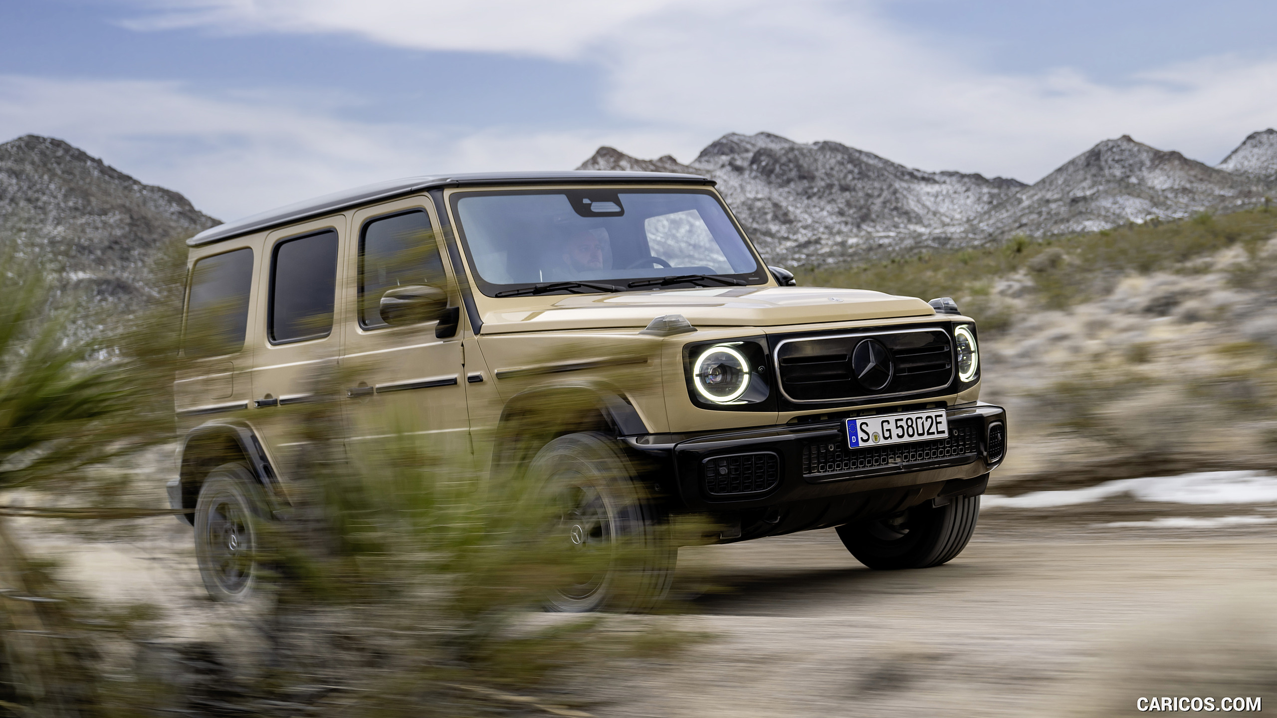 2025 Mercedes-Benz G 580 Electric with EQ Technology (Color: MANUFAKTUR Desert Sand Non-Metallic) - Front Three-Quarter, #30 of 107