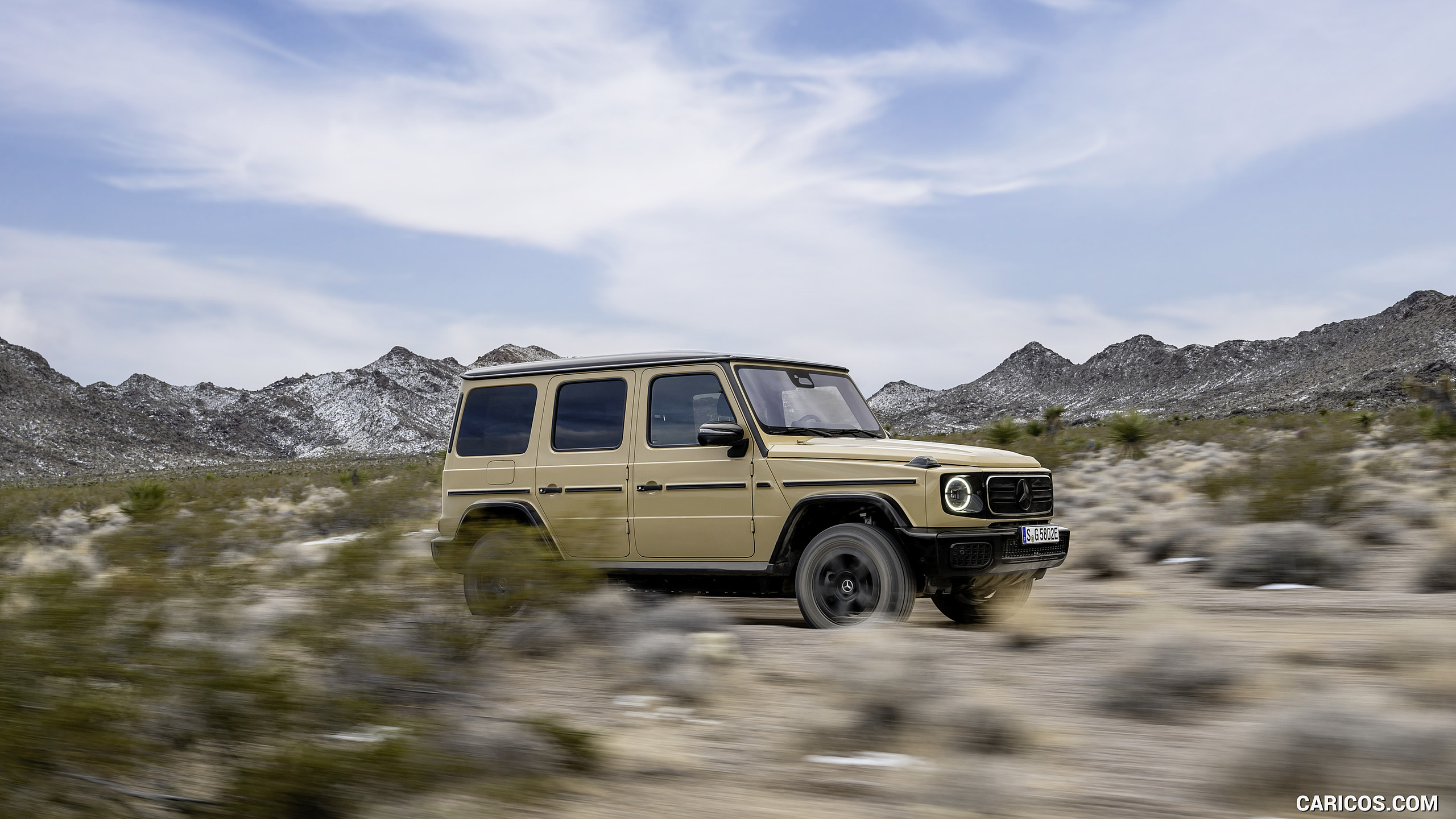 2025 Mercedes-Benz G 580 Electric with EQ Technology (Color: MANUFAKTUR Desert Sand Non-Metallic) - Front Three-Quarter, #31 of 107