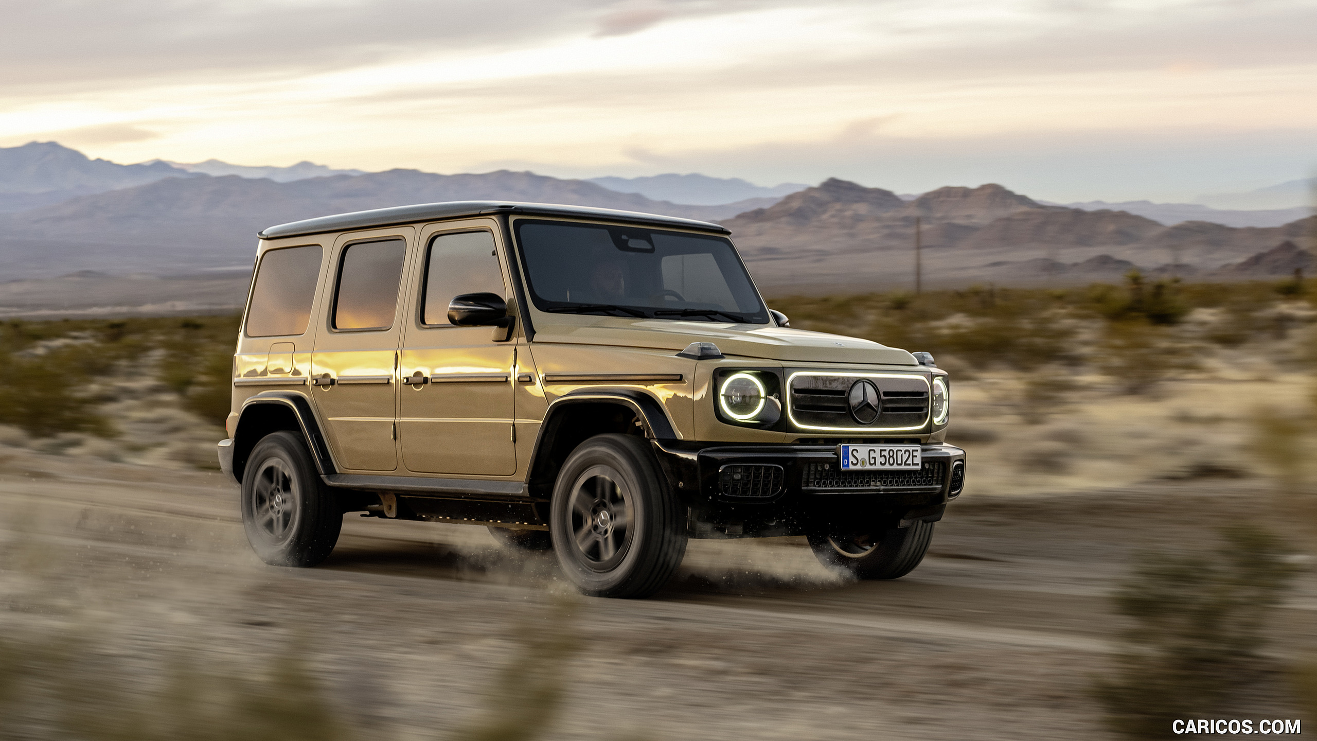 2025 Mercedes-Benz G 580 Electric with EQ Technology (Color: MANUFAKTUR Desert Sand Non-Metallic) - Front Three-Quarter, #33 of 107