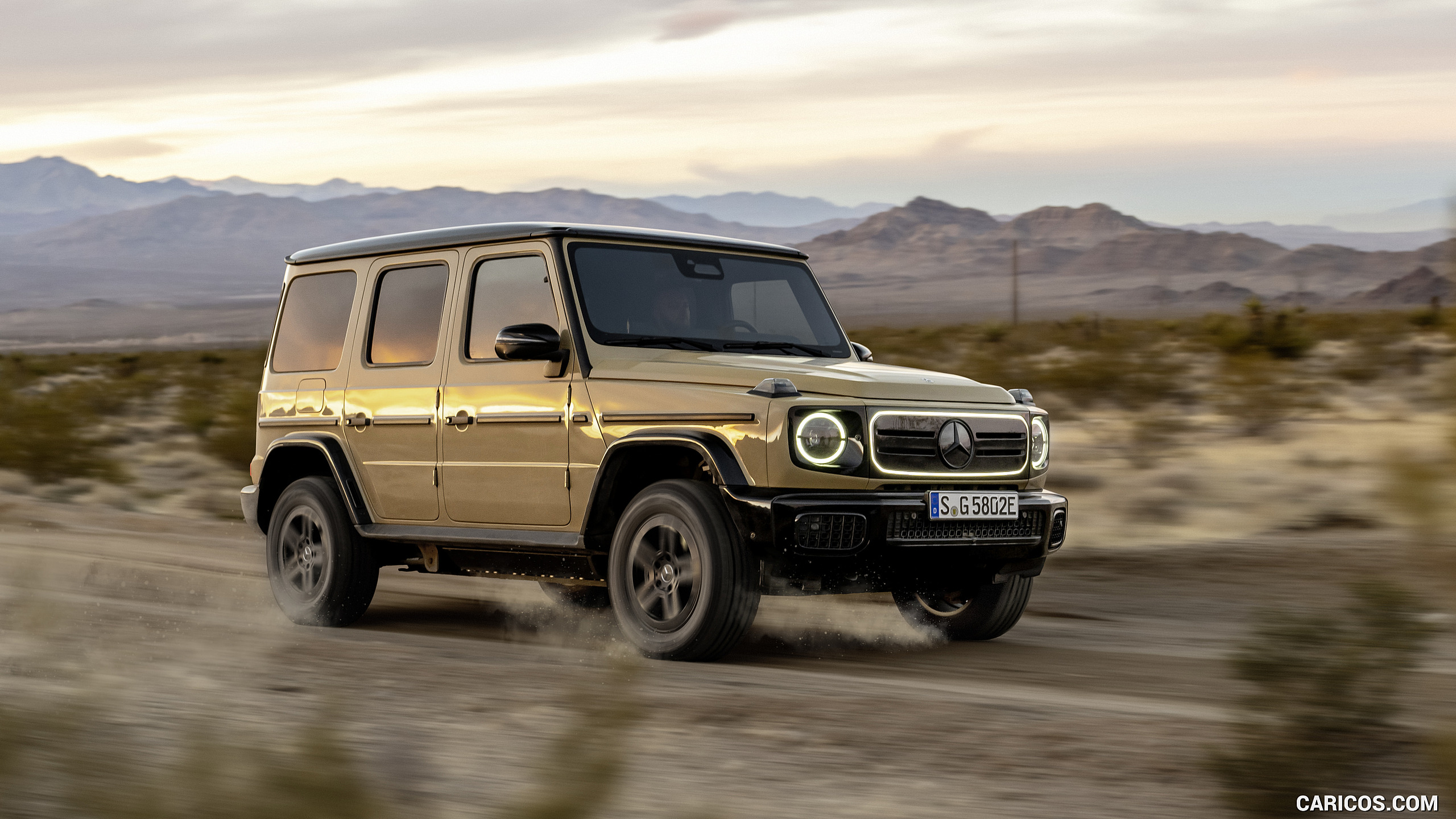 2025 Mercedes-Benz G 580 Electric with EQ Technology (Color: MANUFAKTUR Desert Sand Non-Metallic) - Front Three-Quarter, #33 of 227