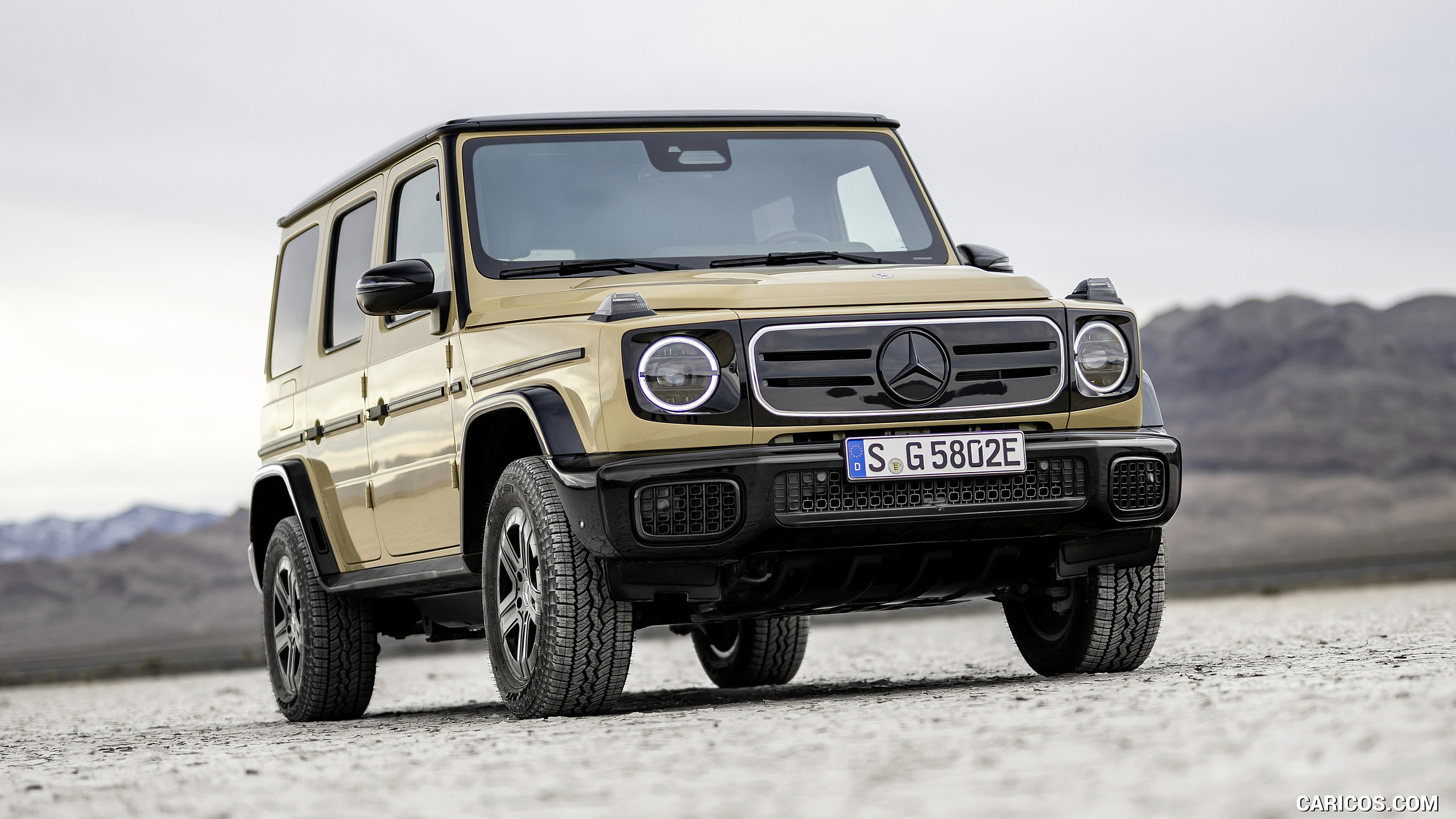 2025 Mercedes-Benz G 580 Electric with EQ Technology (Color: MANUFAKTUR Desert Sand Non-Metallic) - Front Three-Quarter, #45 of 107