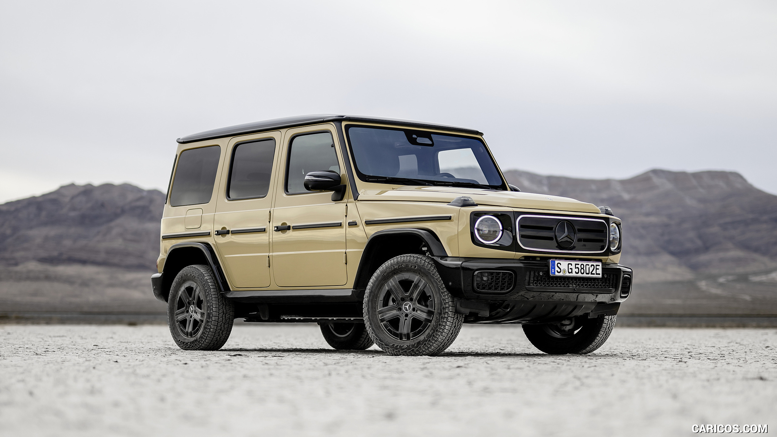 2025 Mercedes-Benz G 580 Electric with EQ Technology (Color: MANUFAKTUR Desert Sand Non-Metallic) - Front Three-Quarter, #46 of 107