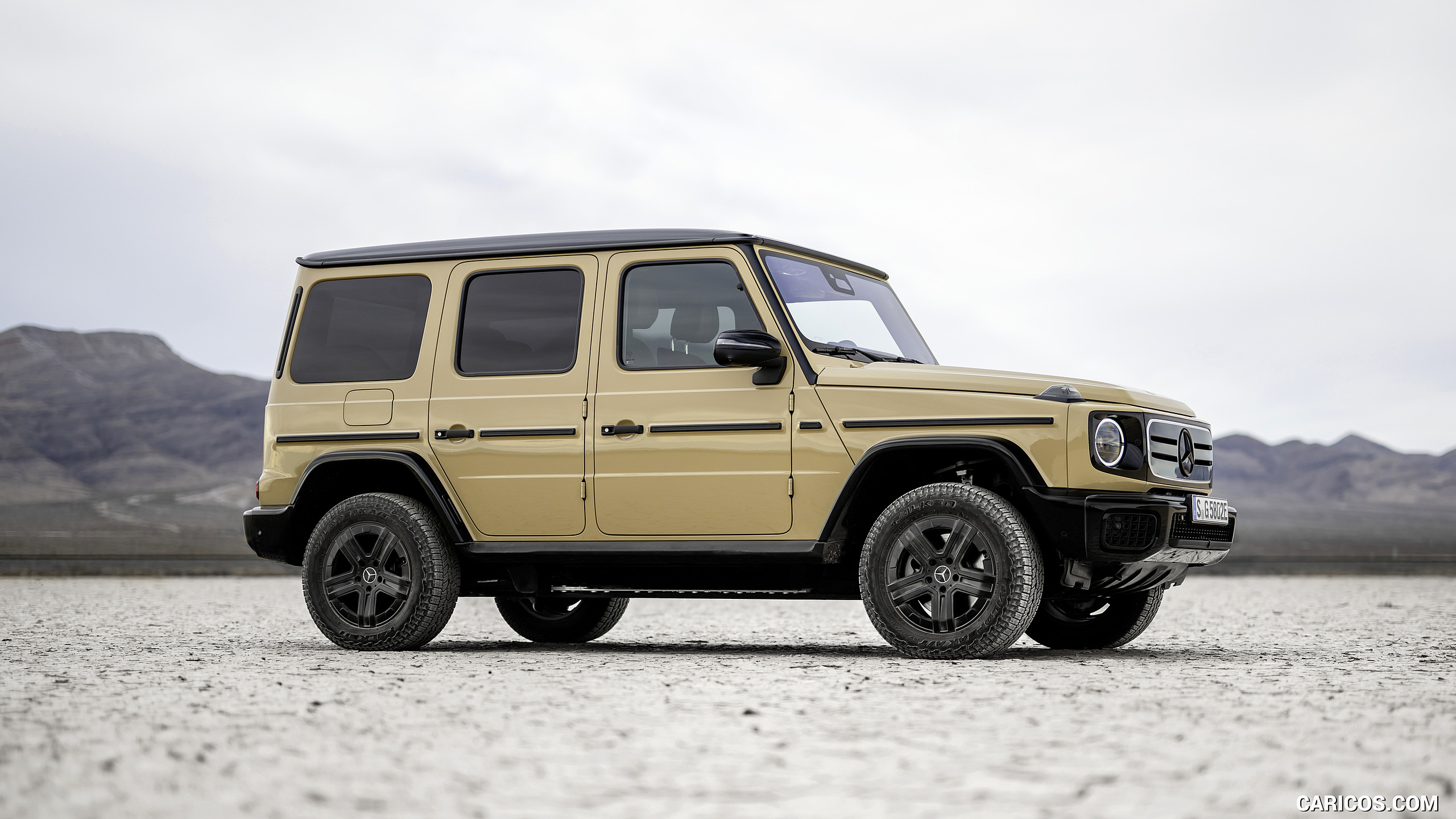2025 Mercedes-Benz G 580 Electric with EQ Technology (Color: MANUFAKTUR Desert Sand Non-Metallic) - Front Three-Quarter, #47 of 107