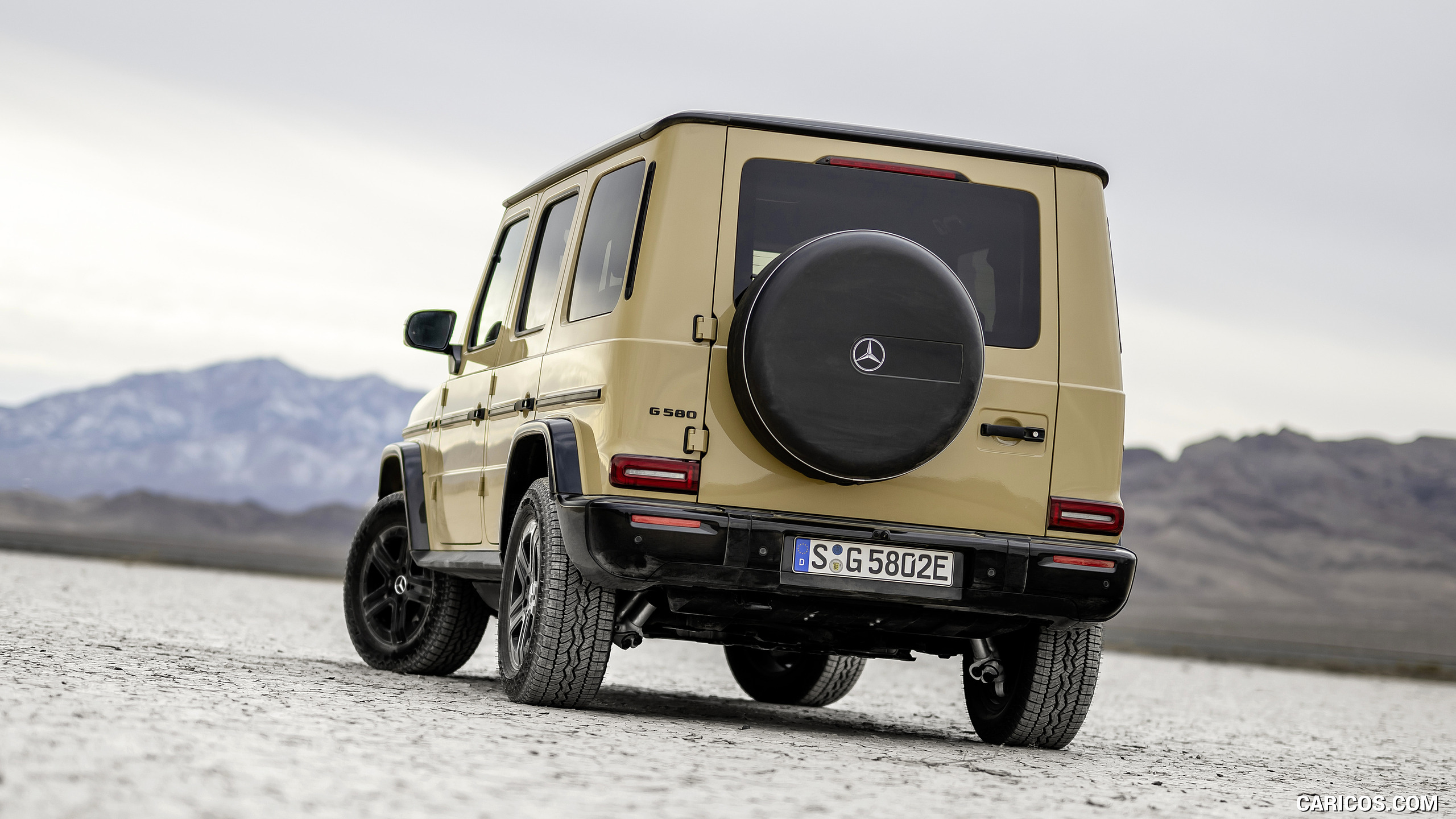 2025 Mercedes-Benz G 580 Electric with EQ Technology (Color: MANUFAKTUR Desert Sand Non-Metallic) - Rear, #48 of 107