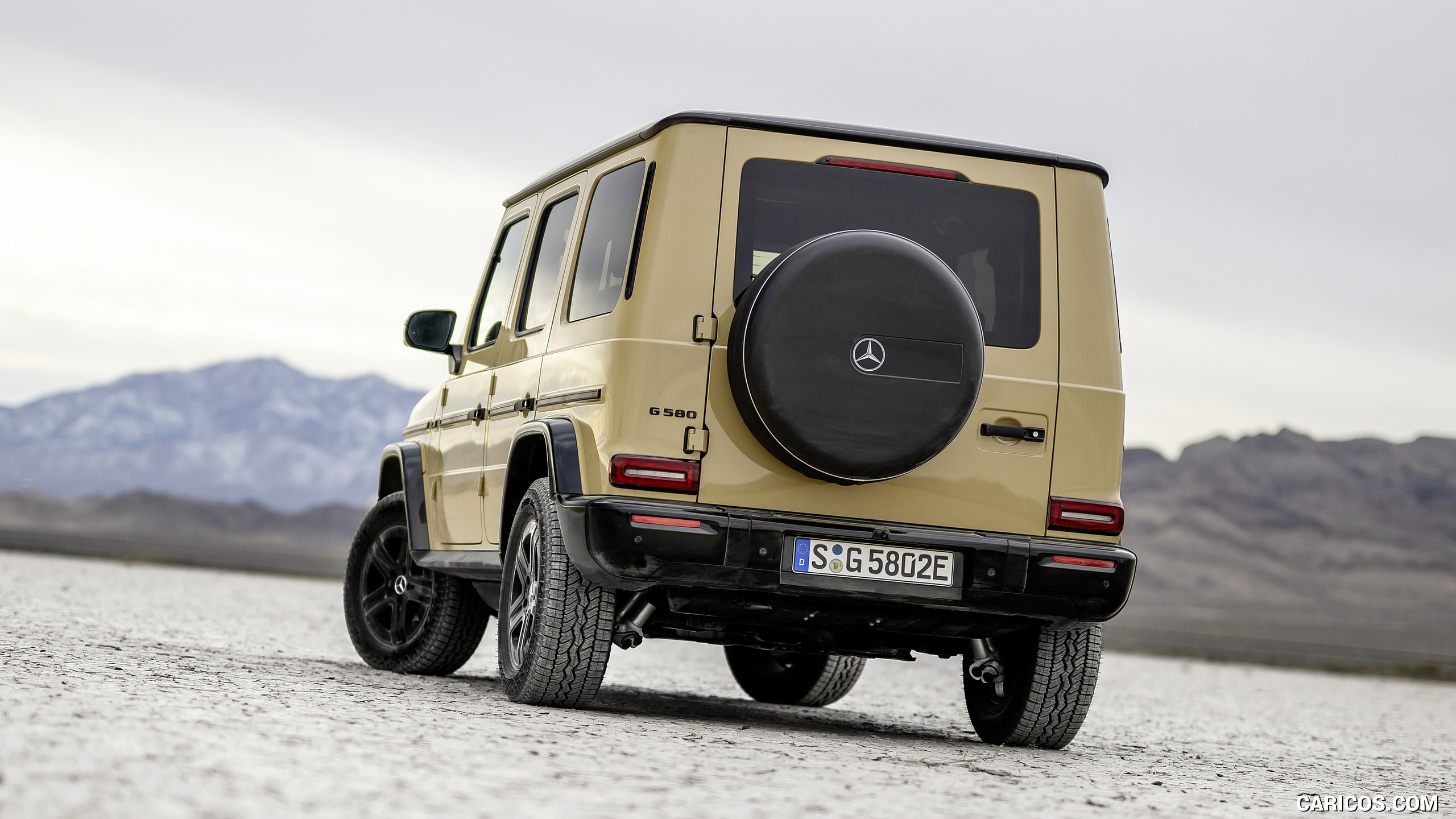 2025 Mercedes-Benz G 580 Electric with EQ Technology (Color: MANUFAKTUR Desert Sand Non-Metallic) - Rear, #48 of 227