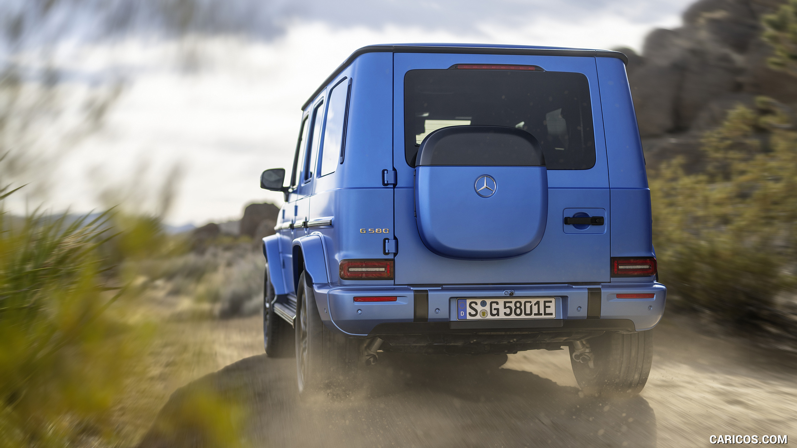2025 Mercedes-Benz G 580 Electric with EQ Technology Edition One (Color: MANUFAKTUR South See Magno) - Rear, #8 of 107