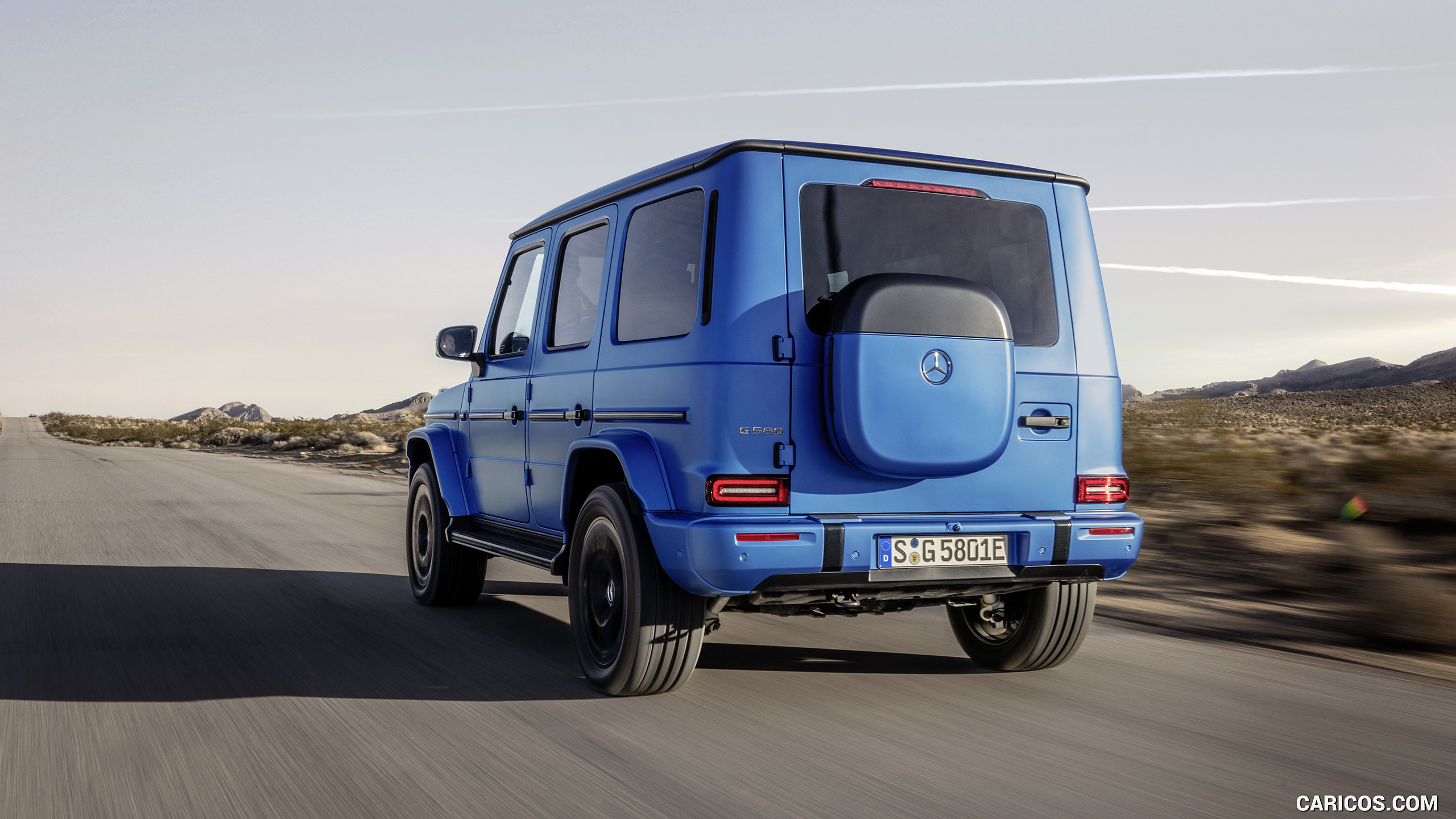 2025 Mercedes-Benz G 580 Electric with EQ Technology Edition One (Color: MANUFAKTUR South See Magno) - Rear Three-Quarter, #2 of 107