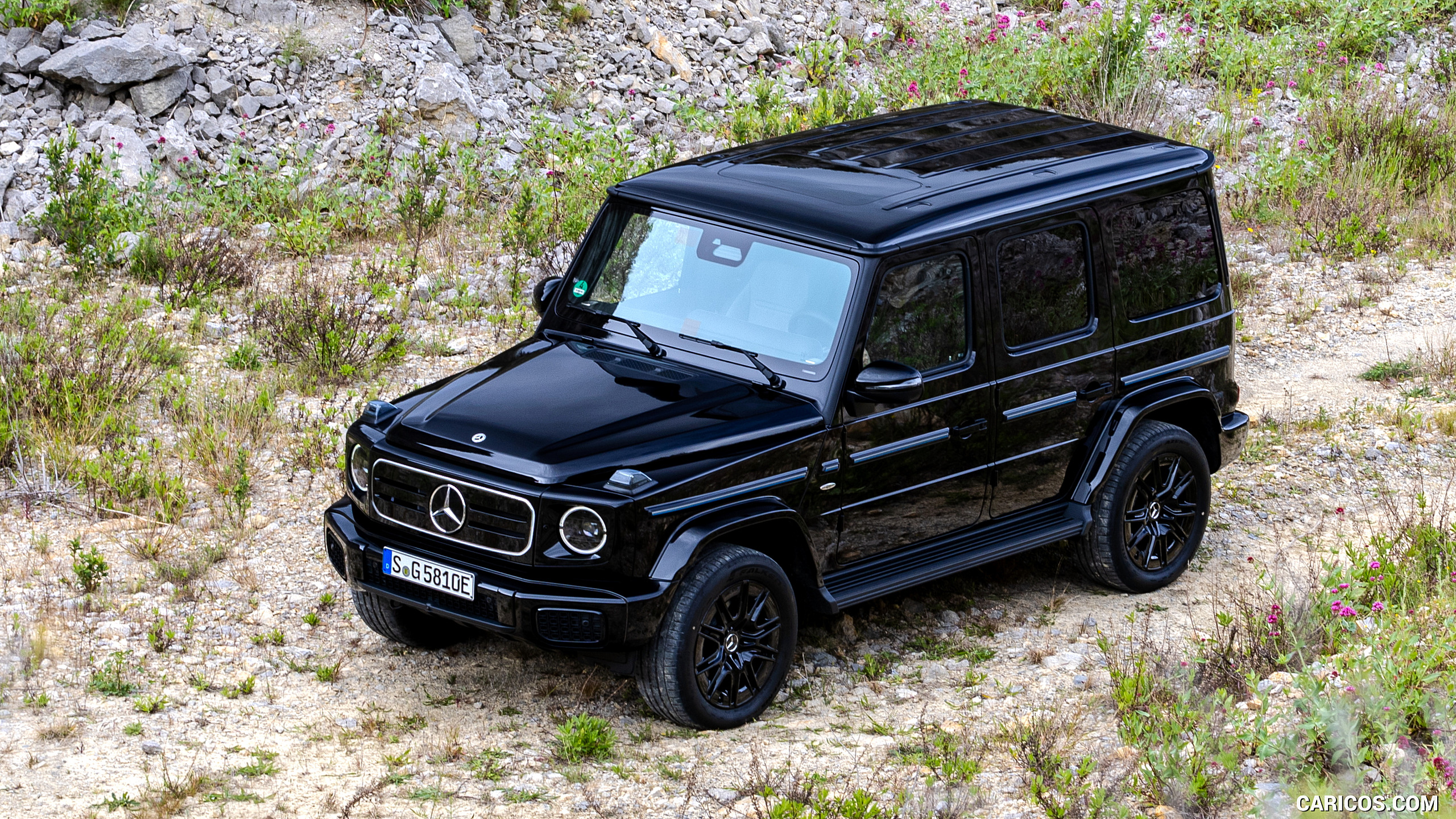 2025 Mercedes-Benz G 580 with EQ Technology (Color: Obsidian Black Metallic) - Front Three-Quarter, #119 of 227